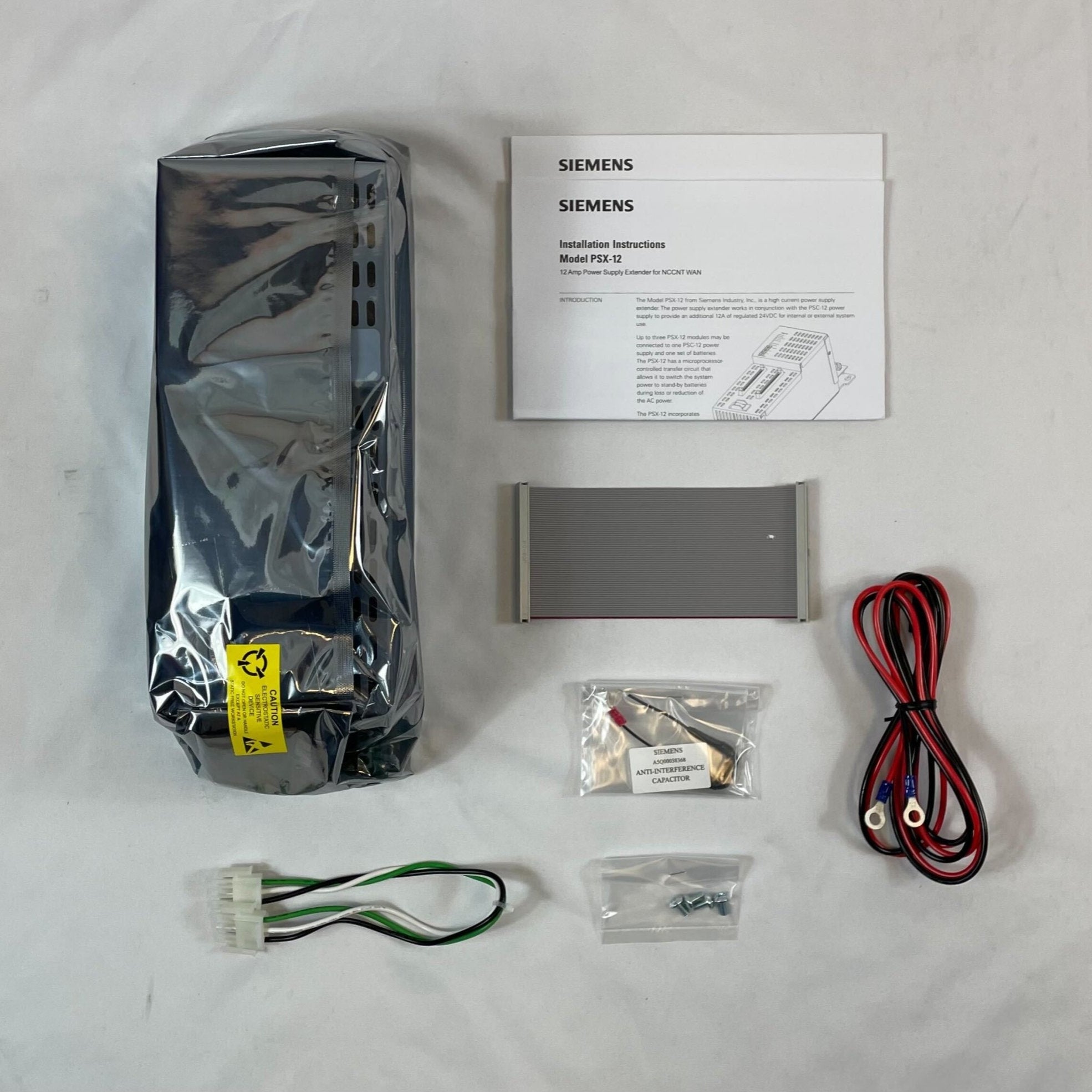 Siemens PSX-12 power supply unit with black casing and connection ports, designed for industrial automation systems.