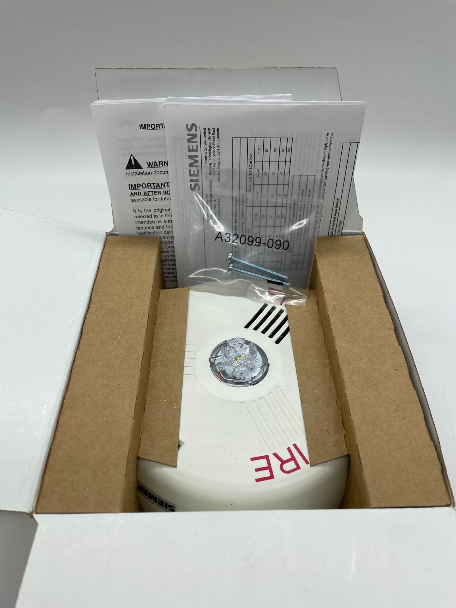 Siemens SLHSCW-F horn strobe alarm with red casing and mounting bracket, designed for emergency notification systems.