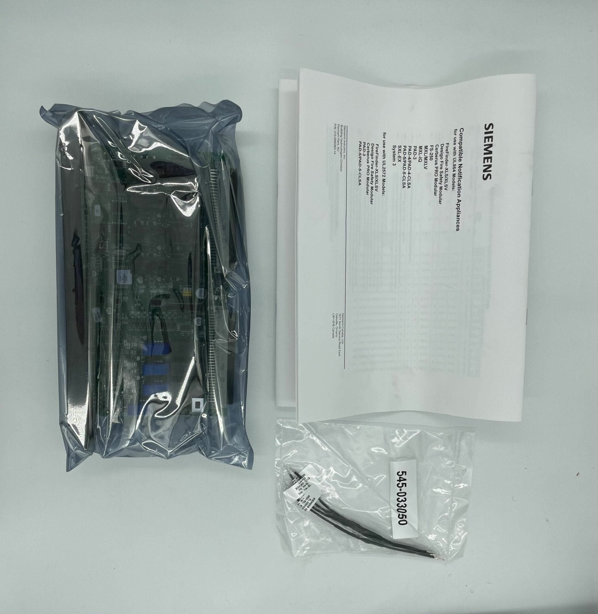 Siemens ZIC-4A NAC system with control unit and wiring, used for industrial or security applications.