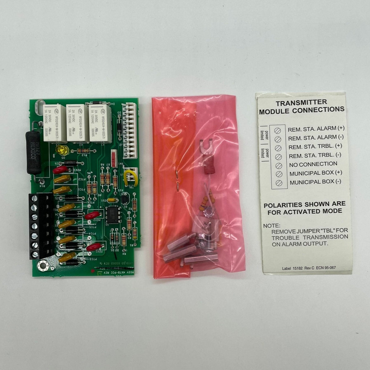 Silent Knight SK-4XTM transmitter module with black circuit board and electronic components for security system integration