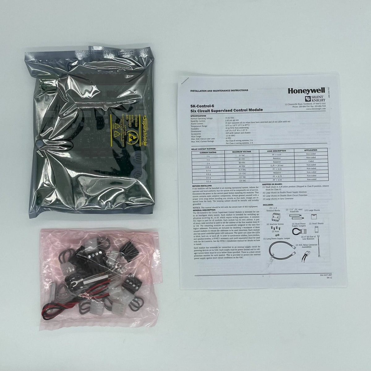 Silent Knight SK-CONTROL-6 output control module with multiple connection ports and a compact design for security system integration.