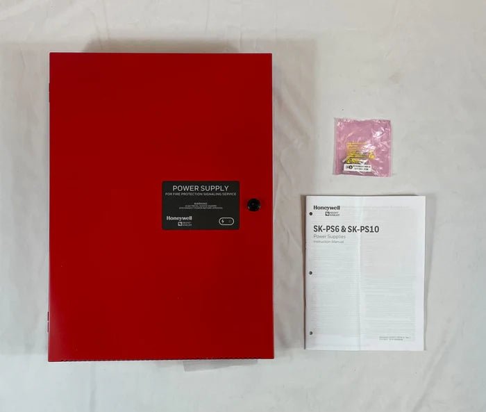 Silent Knight SK-PS10 fire alarm control panel with keypad and display, designed for security and fire safety systems.