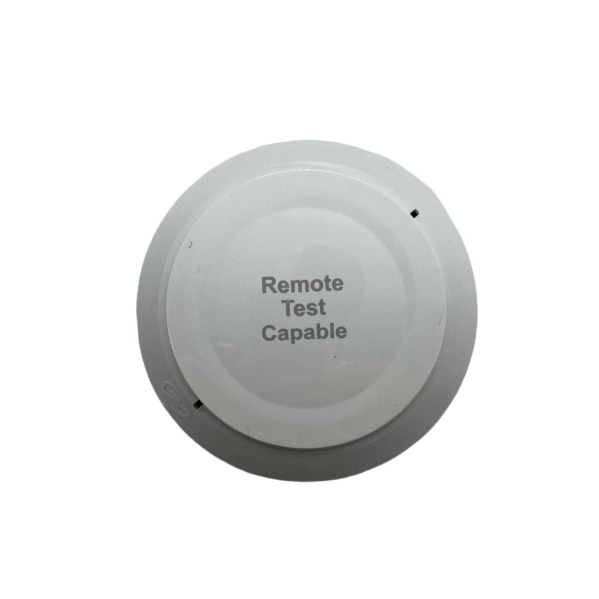 Silent Knight SK-PHOTO-R-W smoke detector with remote test capability, mounted on ceiling with visible detector components.