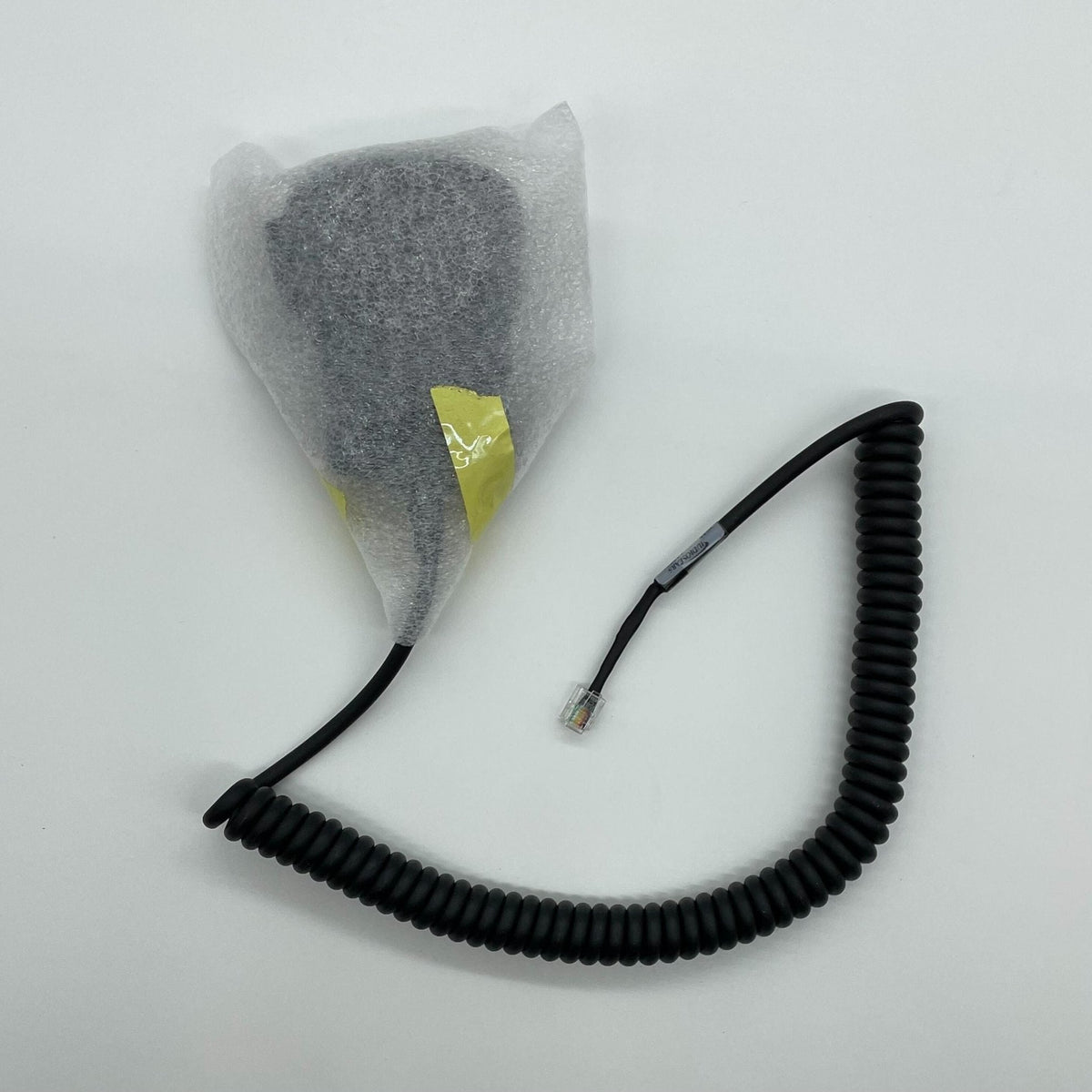 Silent Knight SKE-MIC voice evacuation microphone with black body and adjustable clip for clear communication.