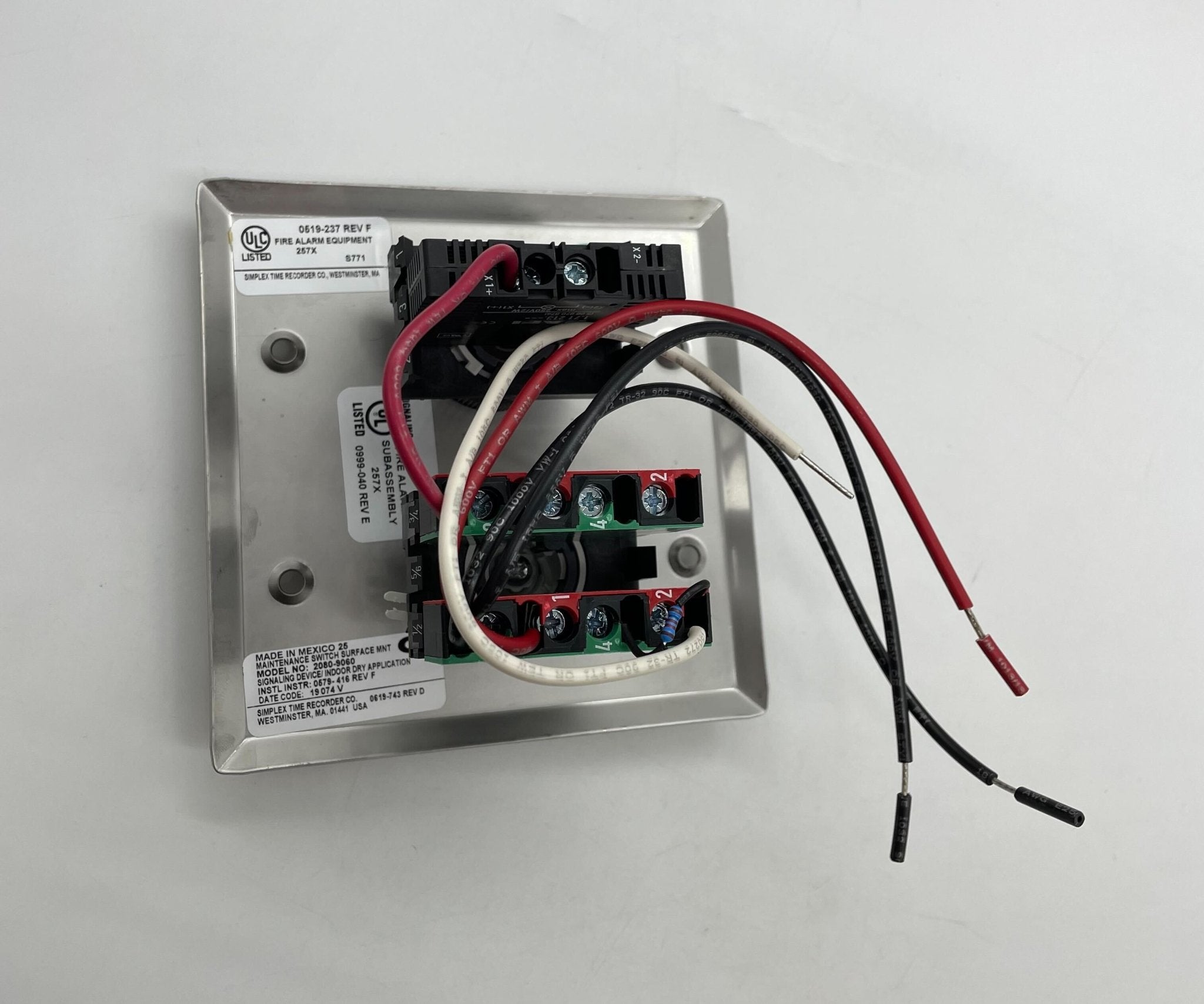 Simplex 2080-9060 fire alarm sensor with wiring and mounting components, designed for building safety systems.