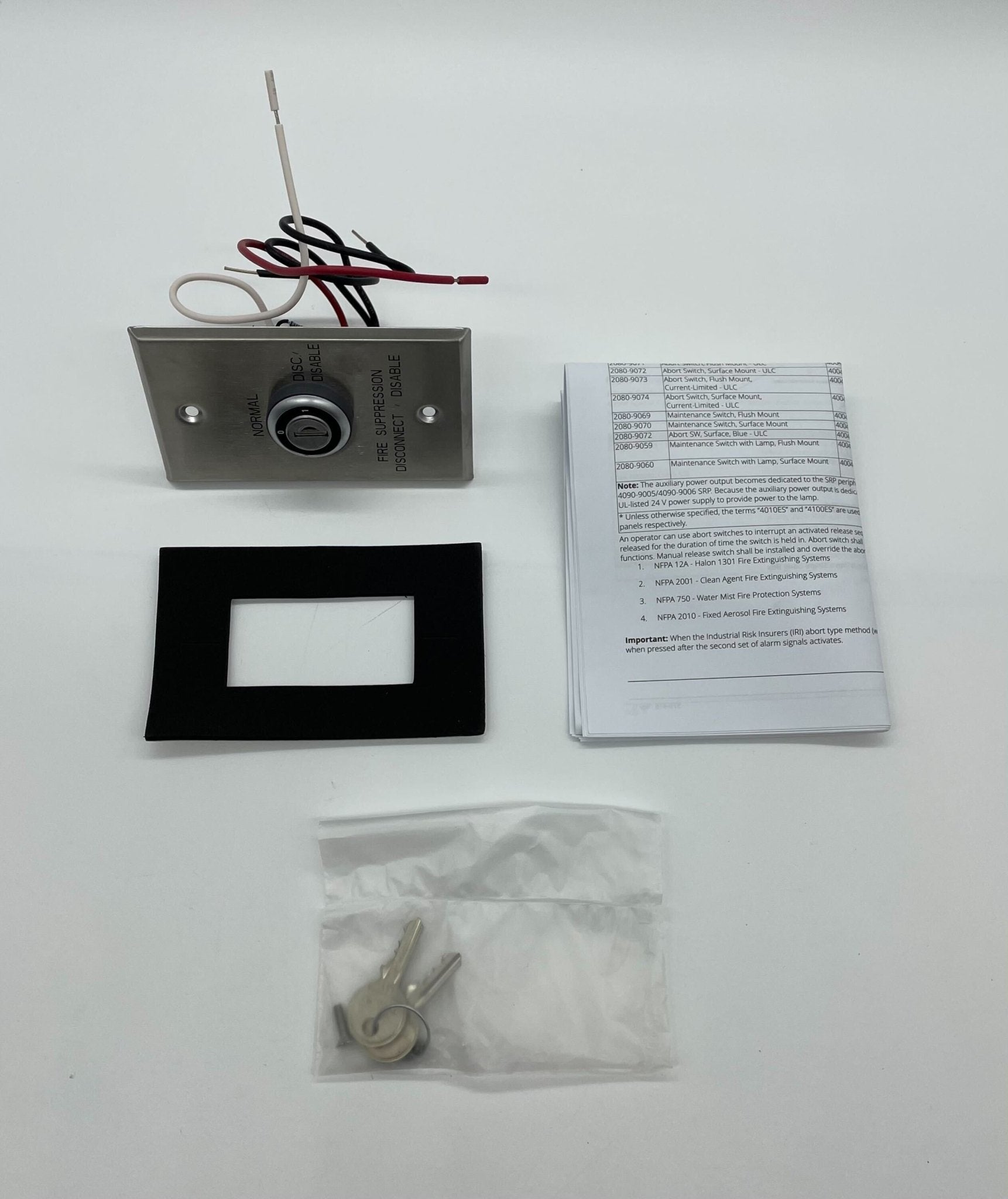 Simplex 2080-9069 fire alarm with alarm bell and control panel, mounted on a wall in a commercial setting