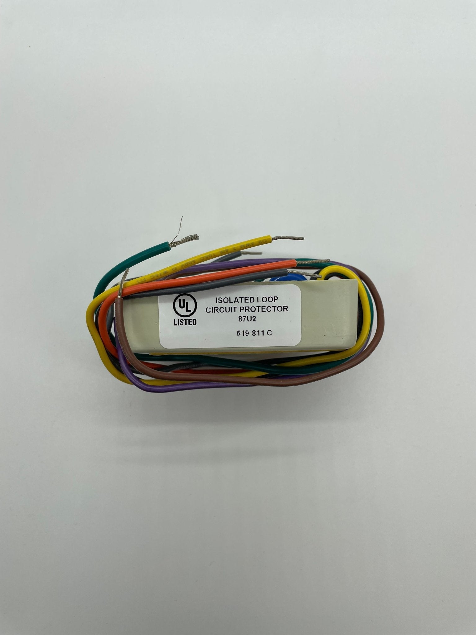 Simplex 2081-9028 fire alarm device by Simplex, mounted on a wall, with wiring visible in the image.
