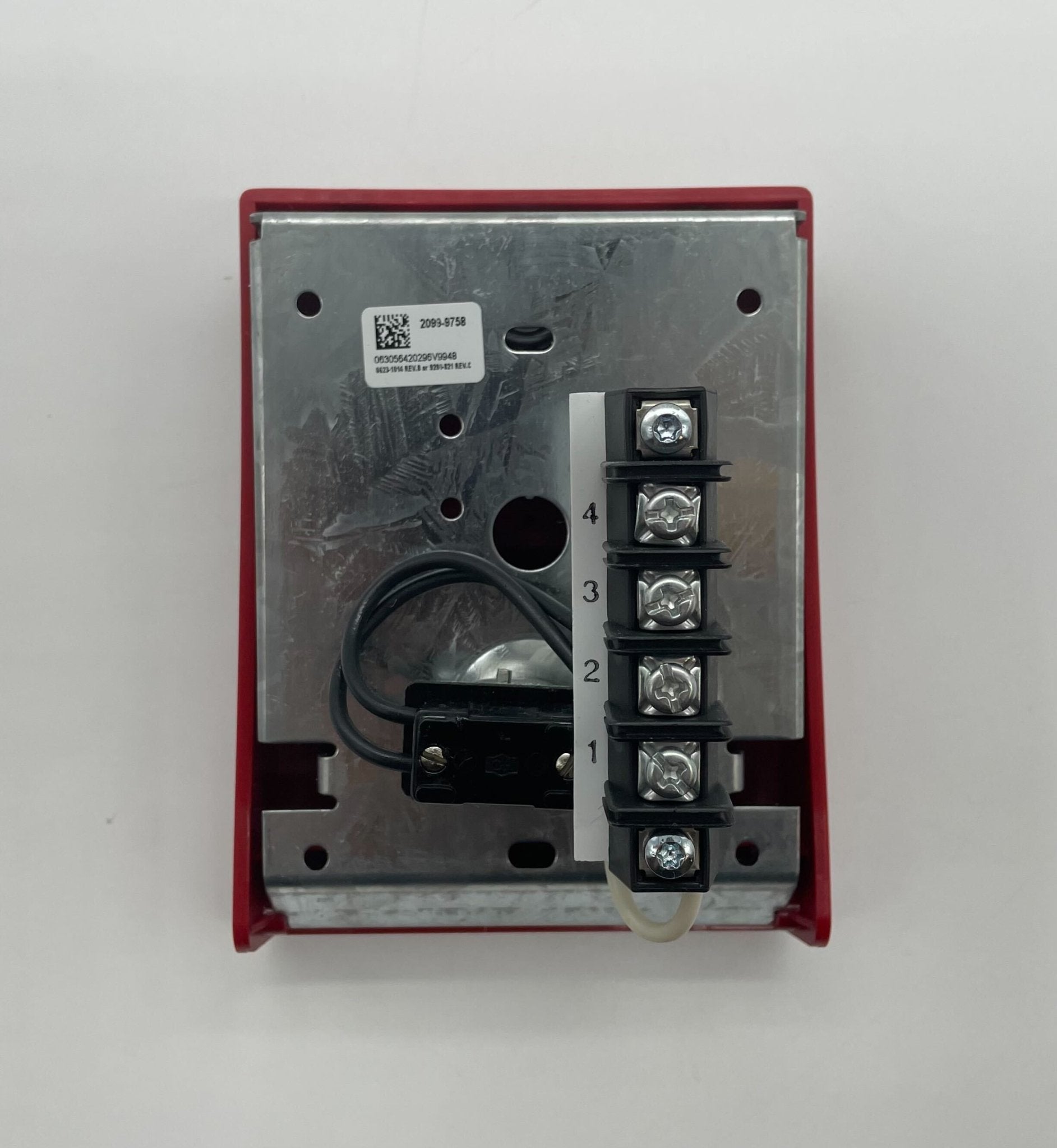 Simplex 2099-9758 pull station fire alarm device mounted on wall, used for emergency notification in buildings