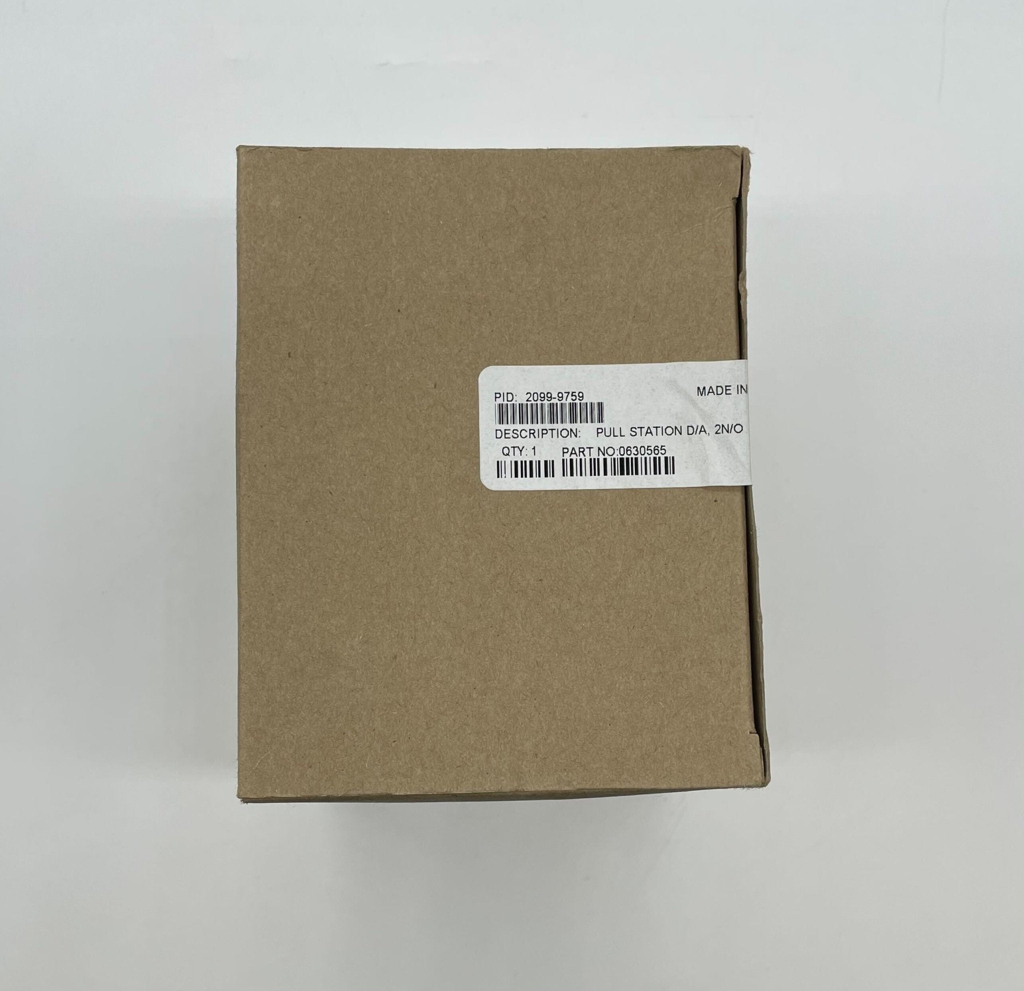 Simplex 2099-9759 pull station alarm switch, white emergency fire alarm device by Simplex, mounted on a wall.