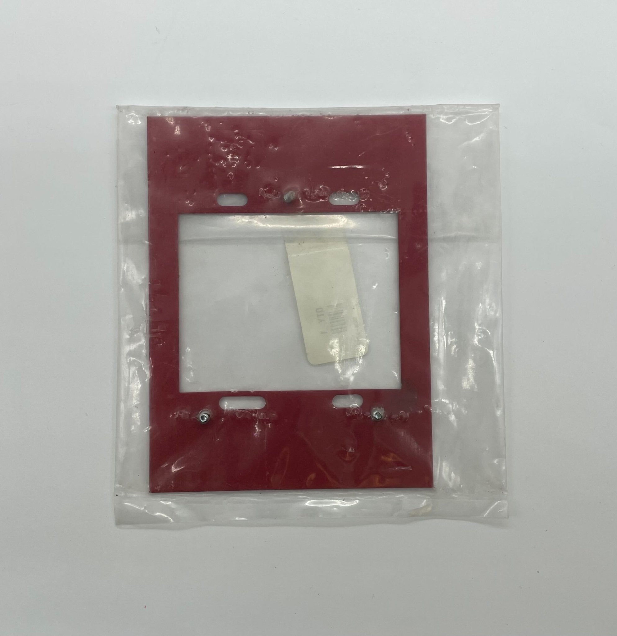 Simplex 2099-9813 pull station emergency alarm device mounted on wall for fire safety.