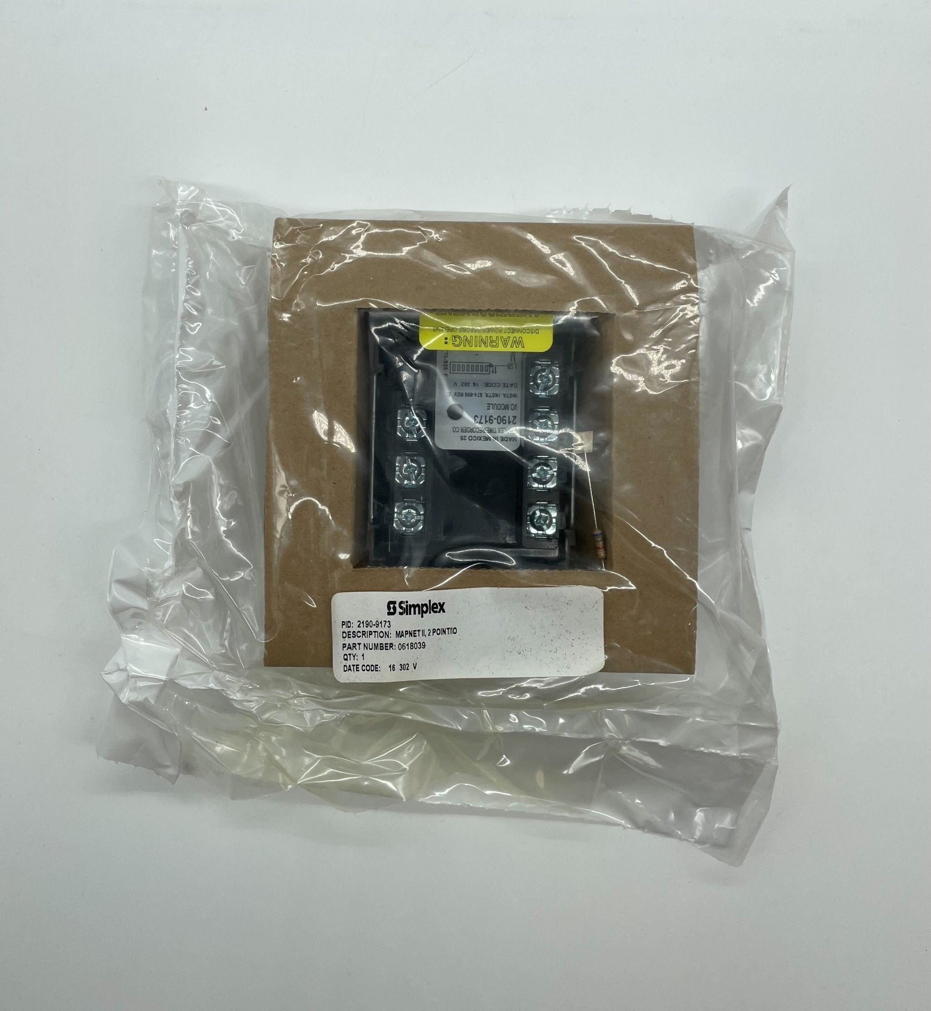 Simplex 2190-9173 fire alarm with a white, compact design, mounted on a wall, from Simplex, for fire safety and detection.