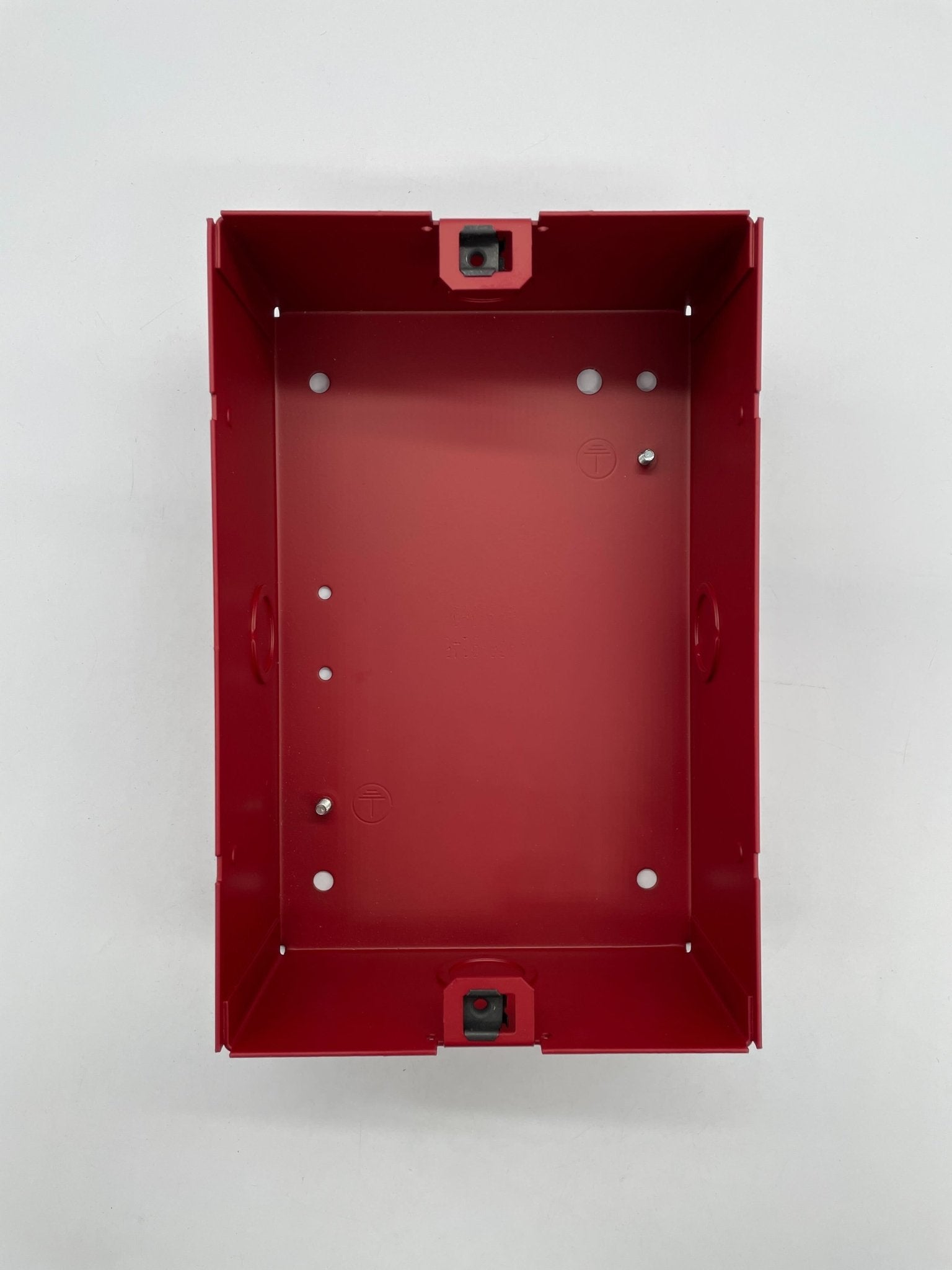 Simplex 2975-9145 fire alarm mounted on wall, with alarm button and indicator light, designed for fire safety systems.