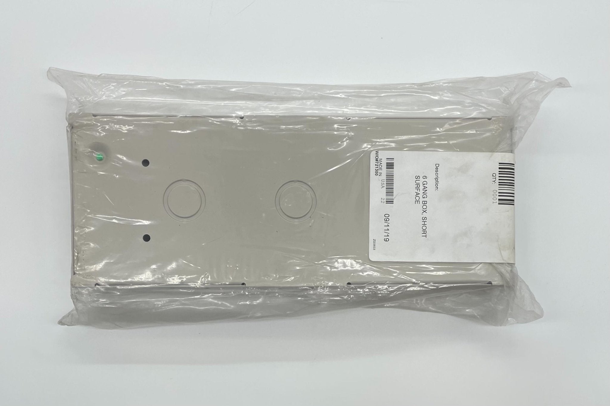 Simplex 2975-9217 fire alarm with white plastic casing and mounting bracket, designed for building safety systems.
