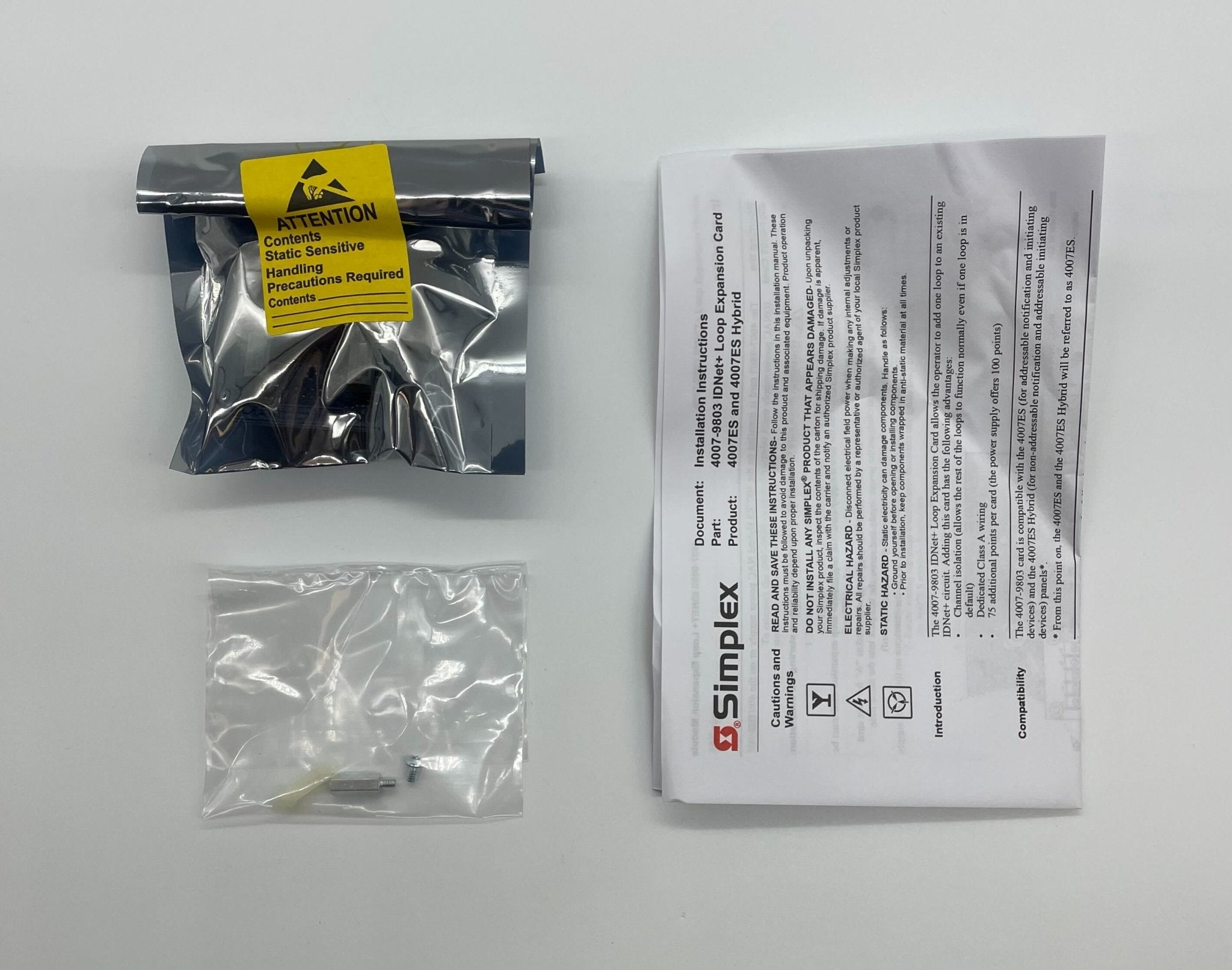 Simplex 4007-9803 fire alarm with multiple sensors and wiring, designed for fire safety systems.