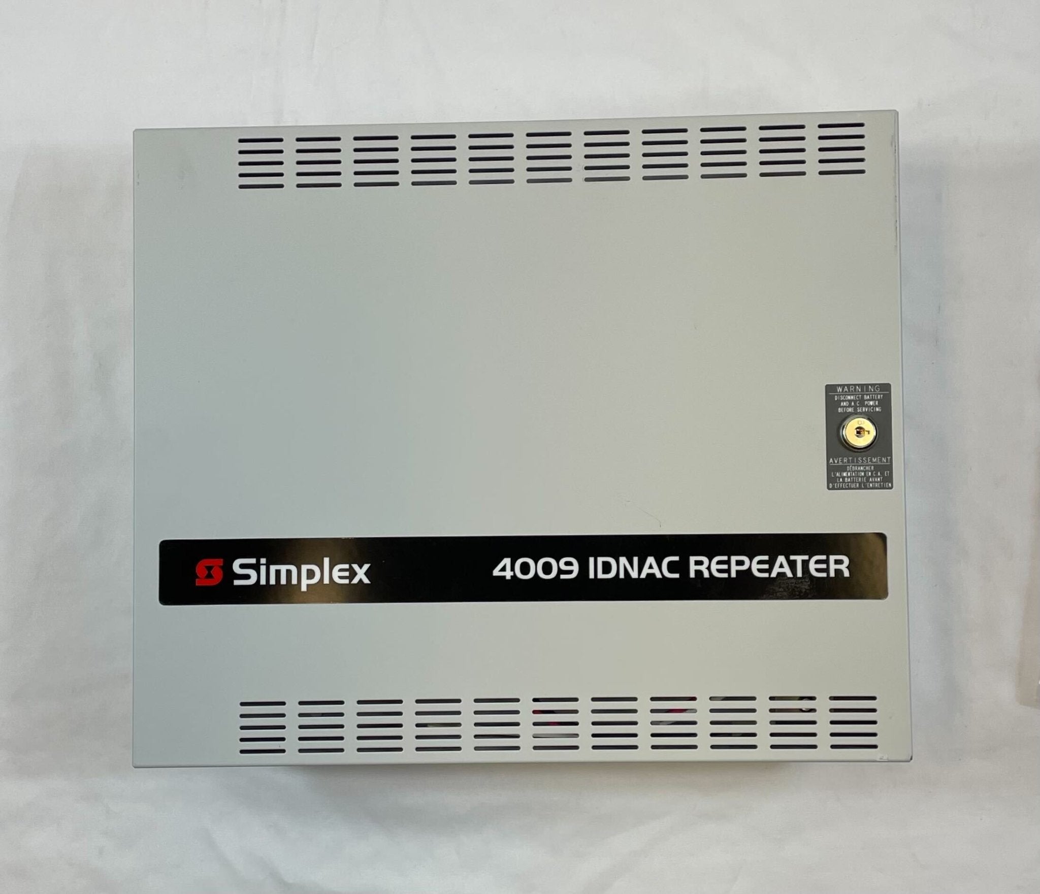 Simplex 4009-9601 NAC module by Simplex, featuring electronic components on a compact circuit board.