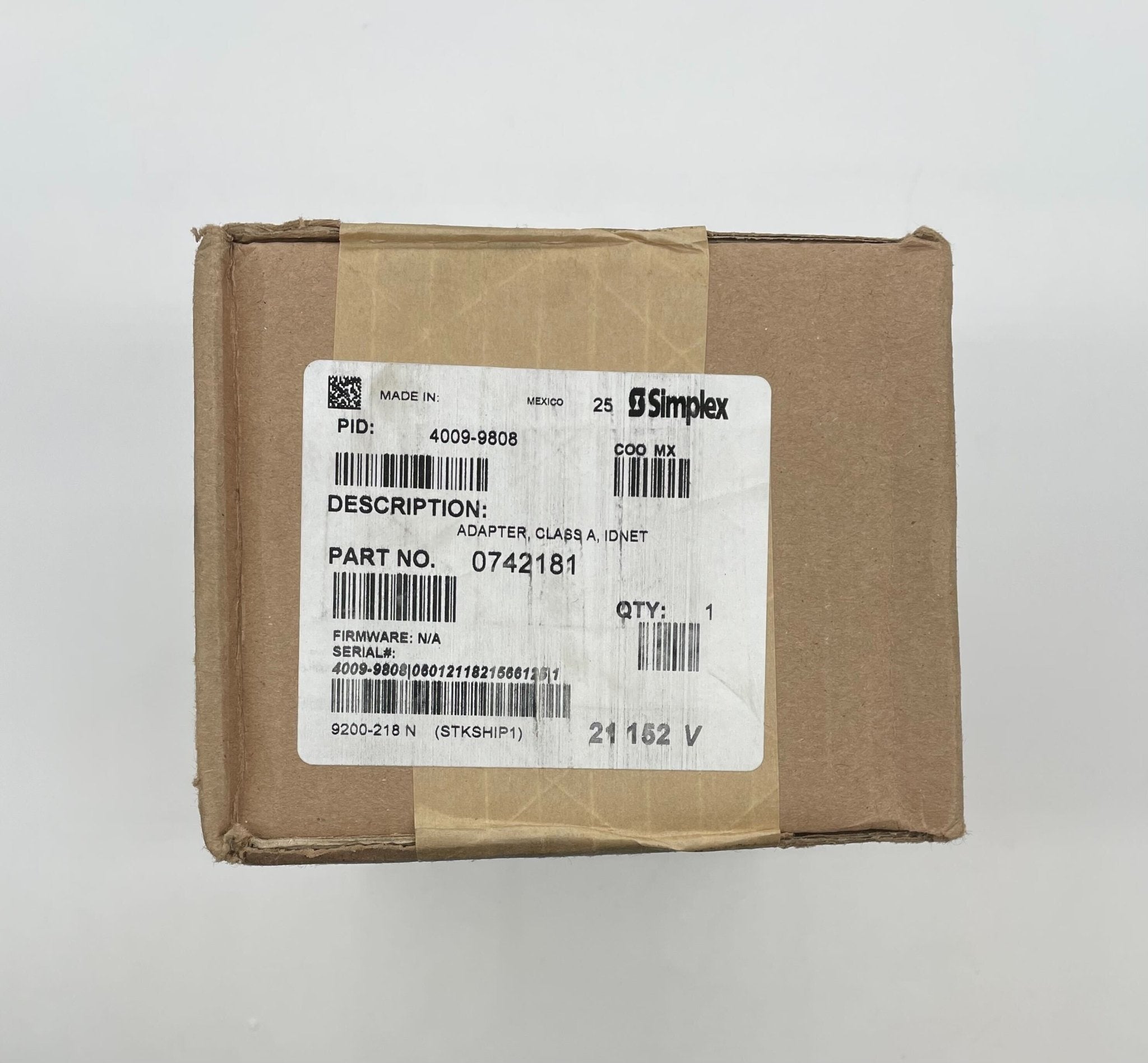 Simplex 4009-9808 fire alarm with white plastic cover and mounting bracket, designed for building safety detection systems.