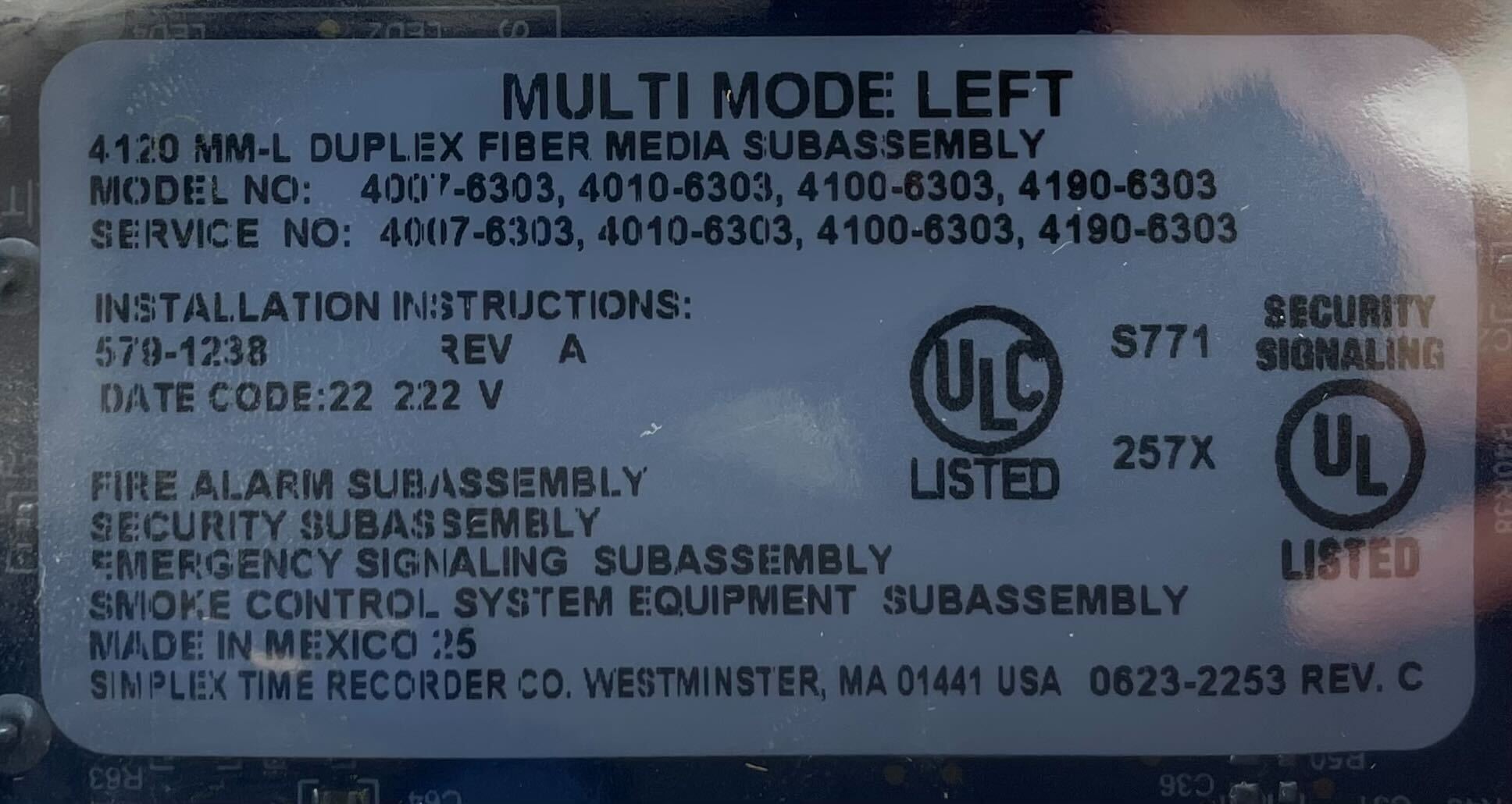 Simplex 4010-6303 fire alarm device from Simplex, shown with wiring and alert components for safety systems.
