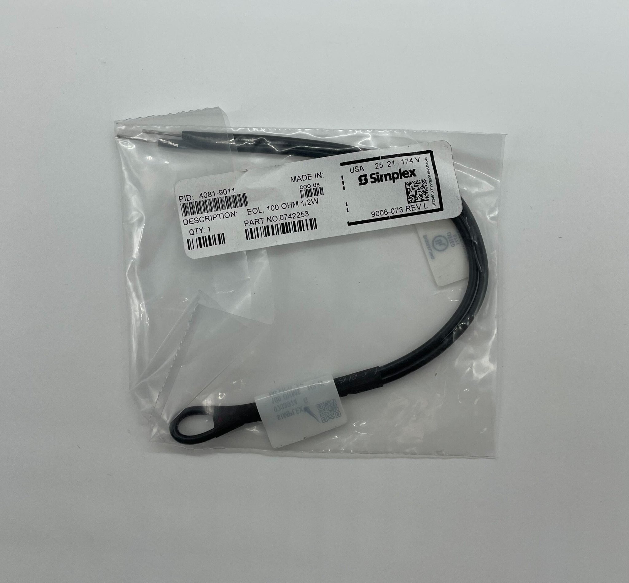 Simplex 4081-9011 EOL resistors shown in a circuit, featuring compact design and labeled with resistance specifications.