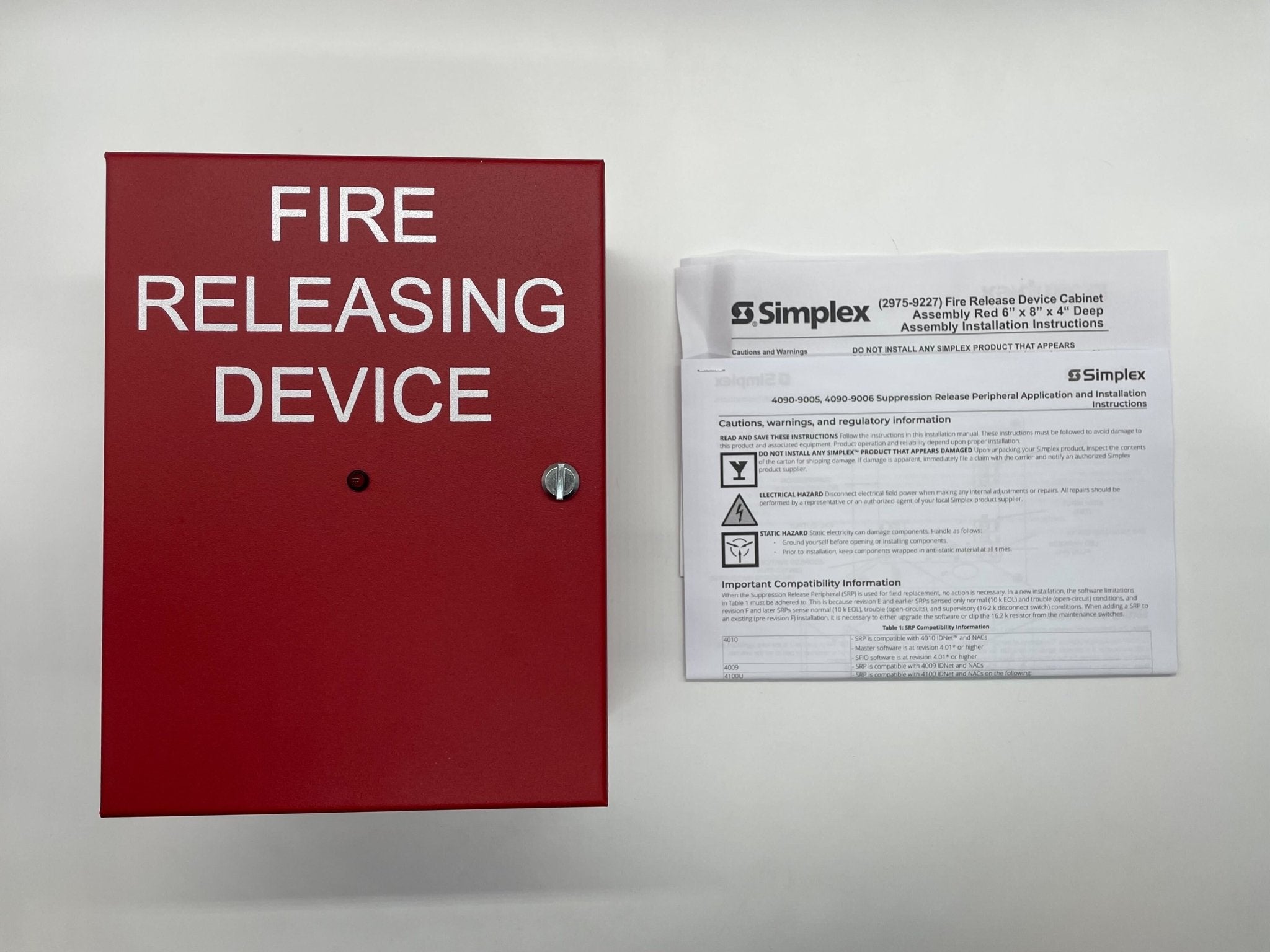 Simplex 4090-9006 fire alarm with alarm bell and control panel for building safety, branded Simplex.