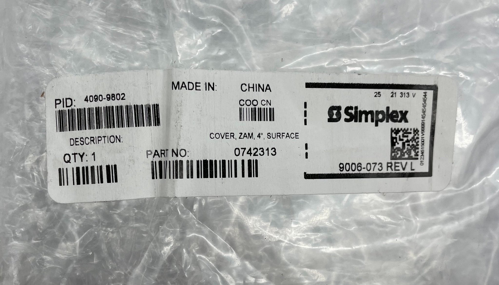 Simplex 4090-9802 covers, black protective covers for electrical or mechanical components, with the Simplex brand logo visible.