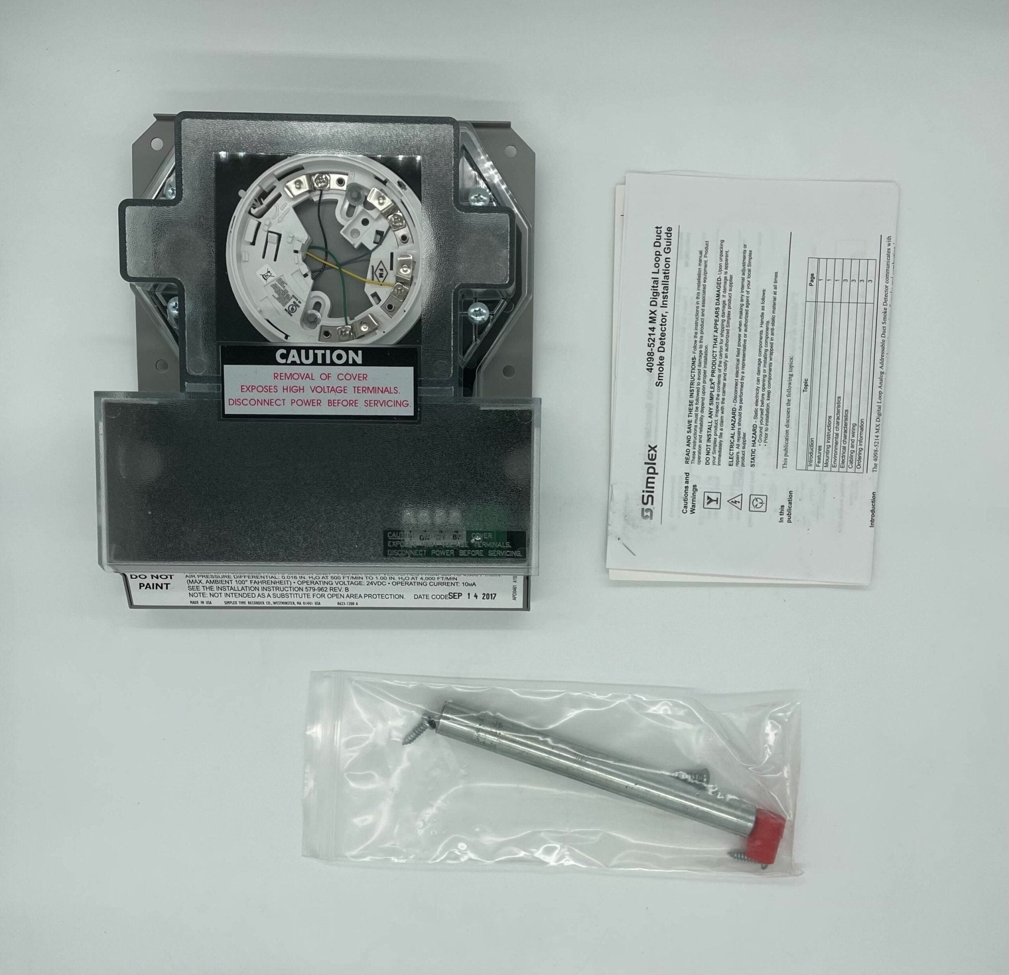 Simplex 4098-5214 duct detector installed in a ceiling, part of Simplex fire detection system for HVAC safety.