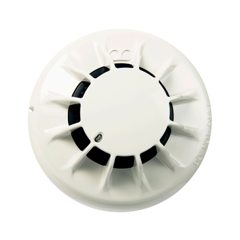 Simplex 4098-5611 fire alarm device with warning indicator, mounted on a wall for fire safety.