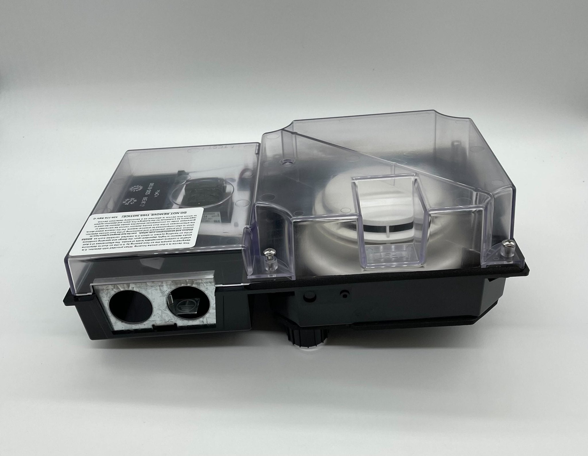 Simplex 4098-9687 duct detector mounted on ceiling for fire detection and ventilation system monitoring.