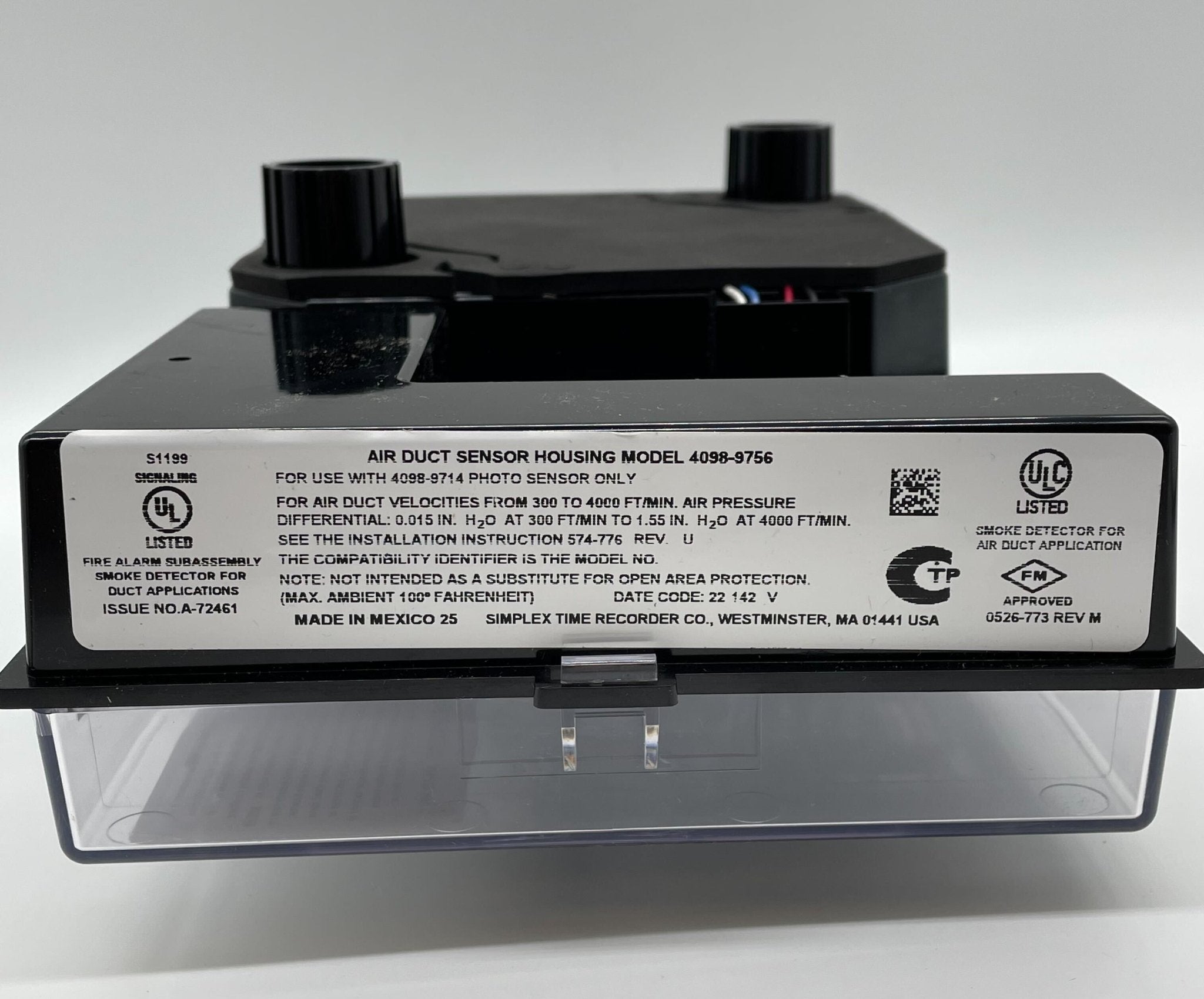 Simplex 4098-9756 duct detector installed in ceiling, part of fire alarm system by Simplex for building safety.