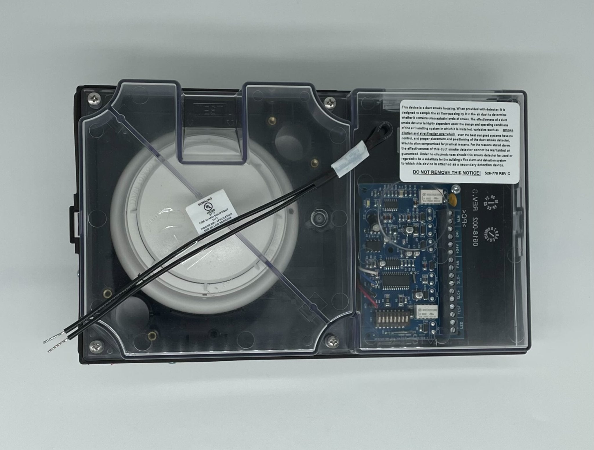 Simplex 4098-9756 duct detector with wiring and mounting components for fire alarm systems.