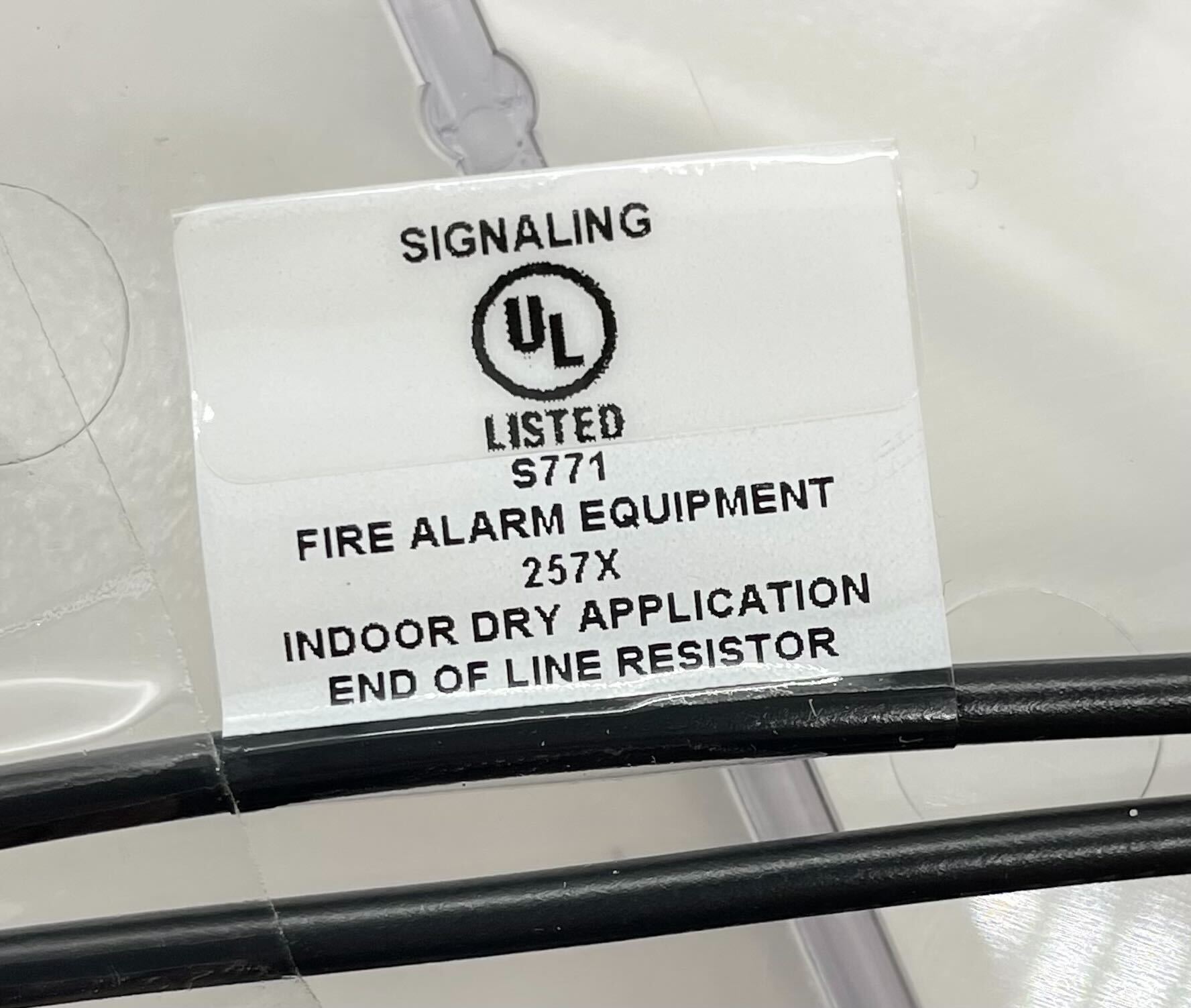 Simplex 4098-9756 duct detector installed in a ceiling for smoke detection and fire alarm system.