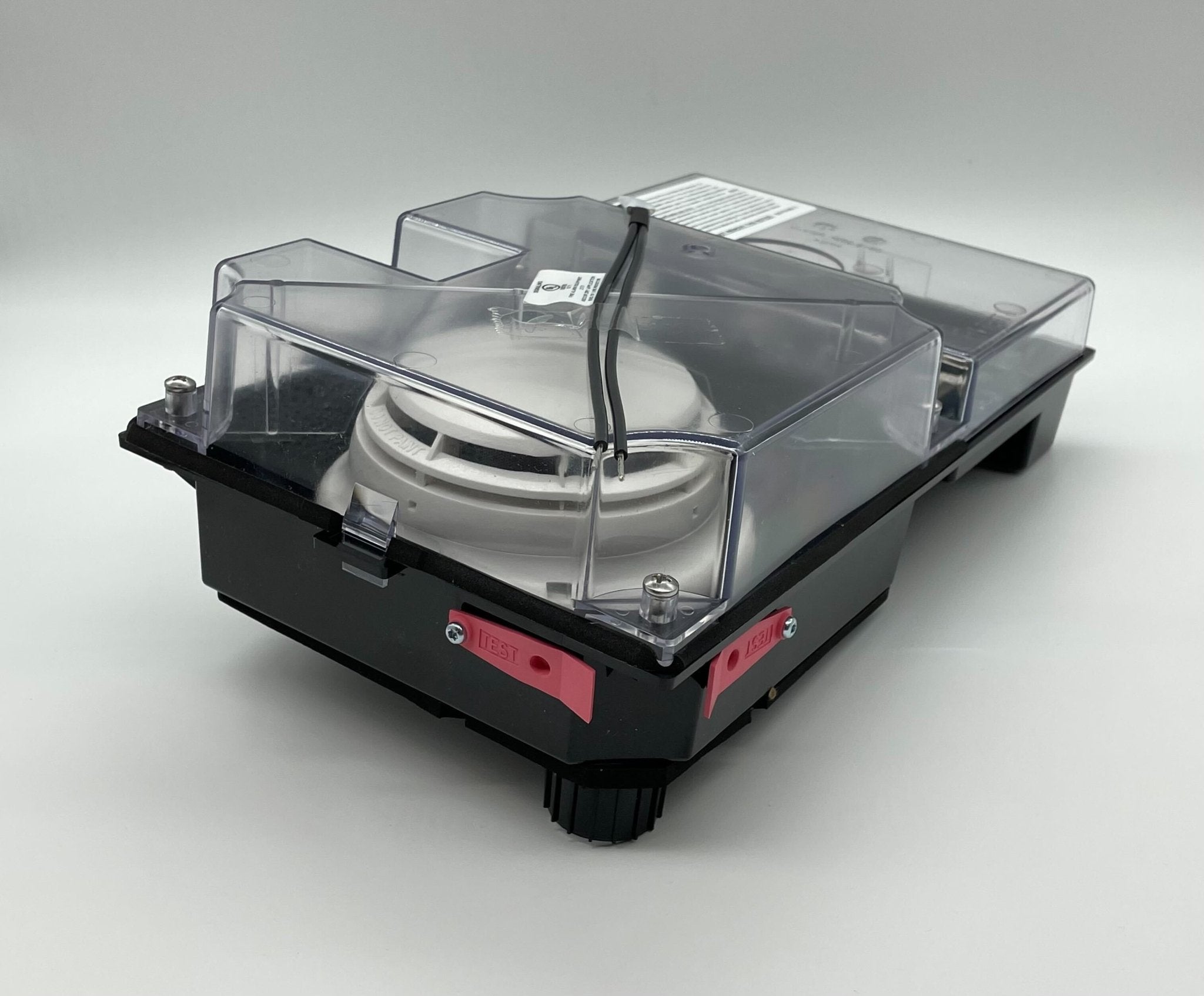 Simplex 4098-9756 duct detector installed in a ceiling HVAC system, featuring a compact design by Simplex.