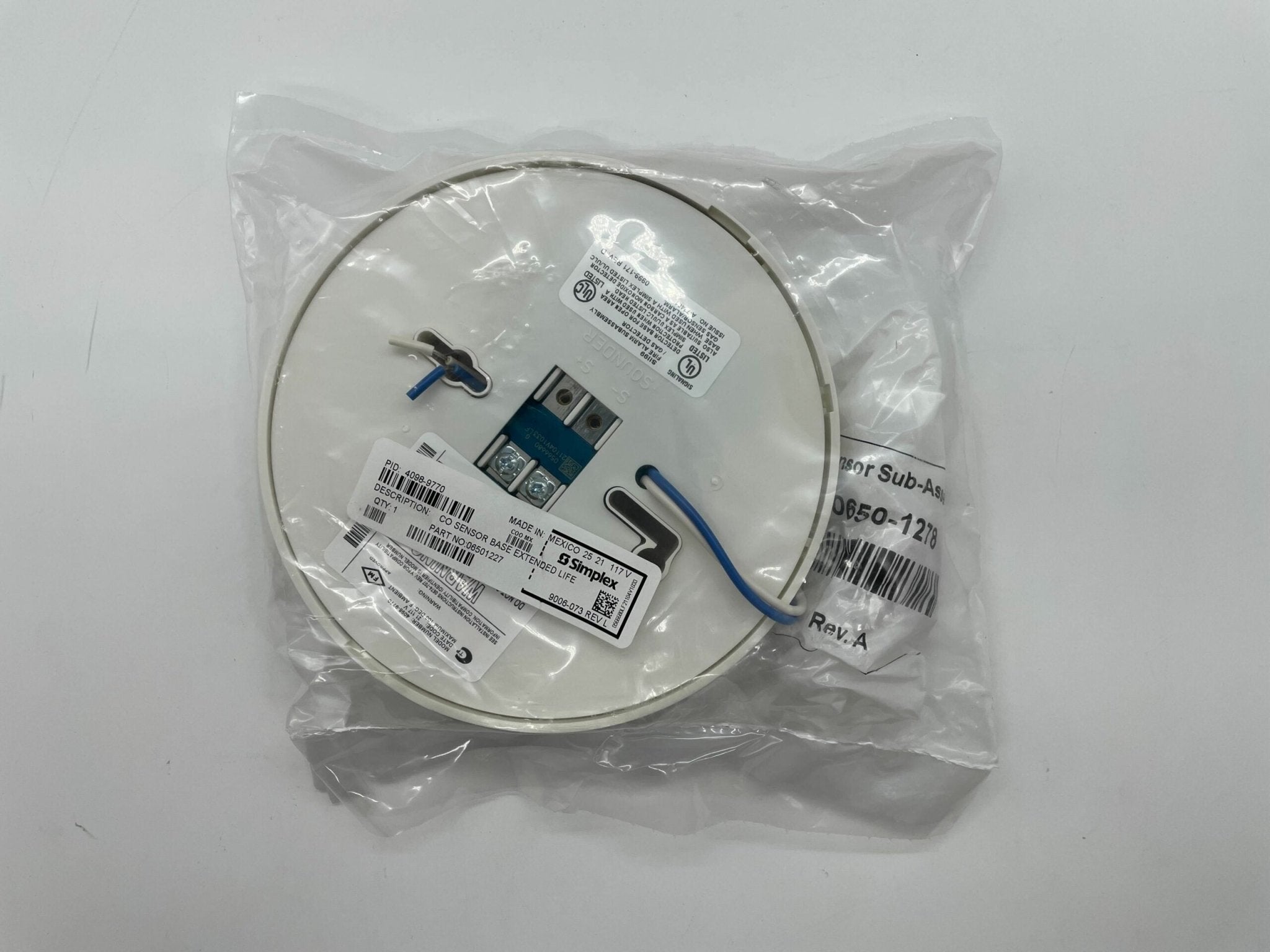 Simplex 4098-9770 base component, part of the Simplex security system, shown in a close-up view.