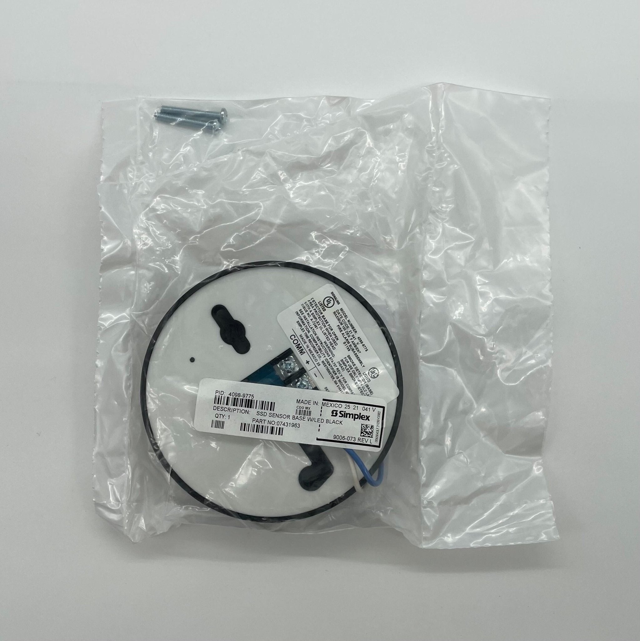 Simplex 4098-9775 base for security systems, shown in black with mounting features, by Simplex.
