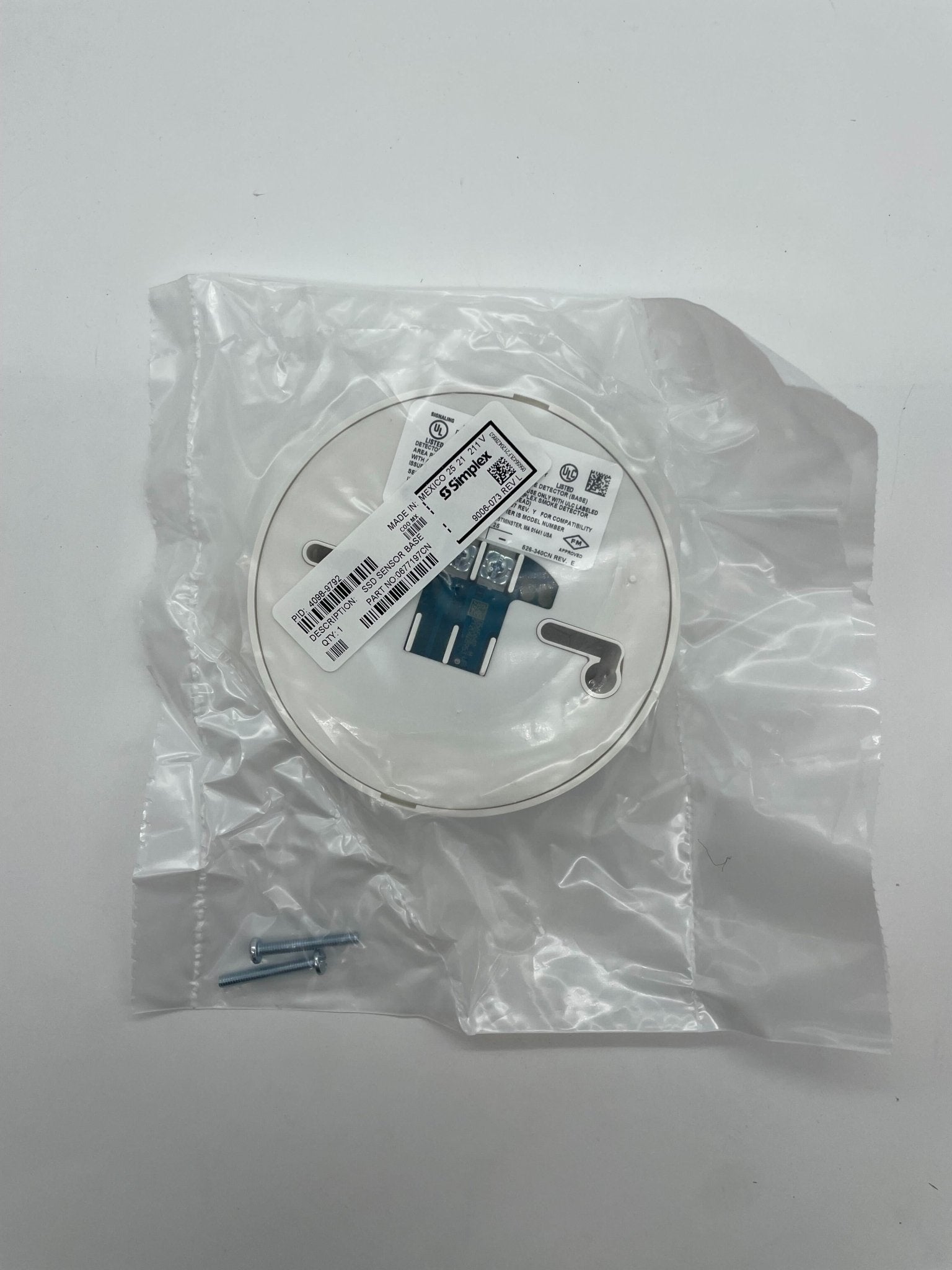 Simplex 4098-9792 base, a durable electrical component from Simplex, shown in a close-up image.