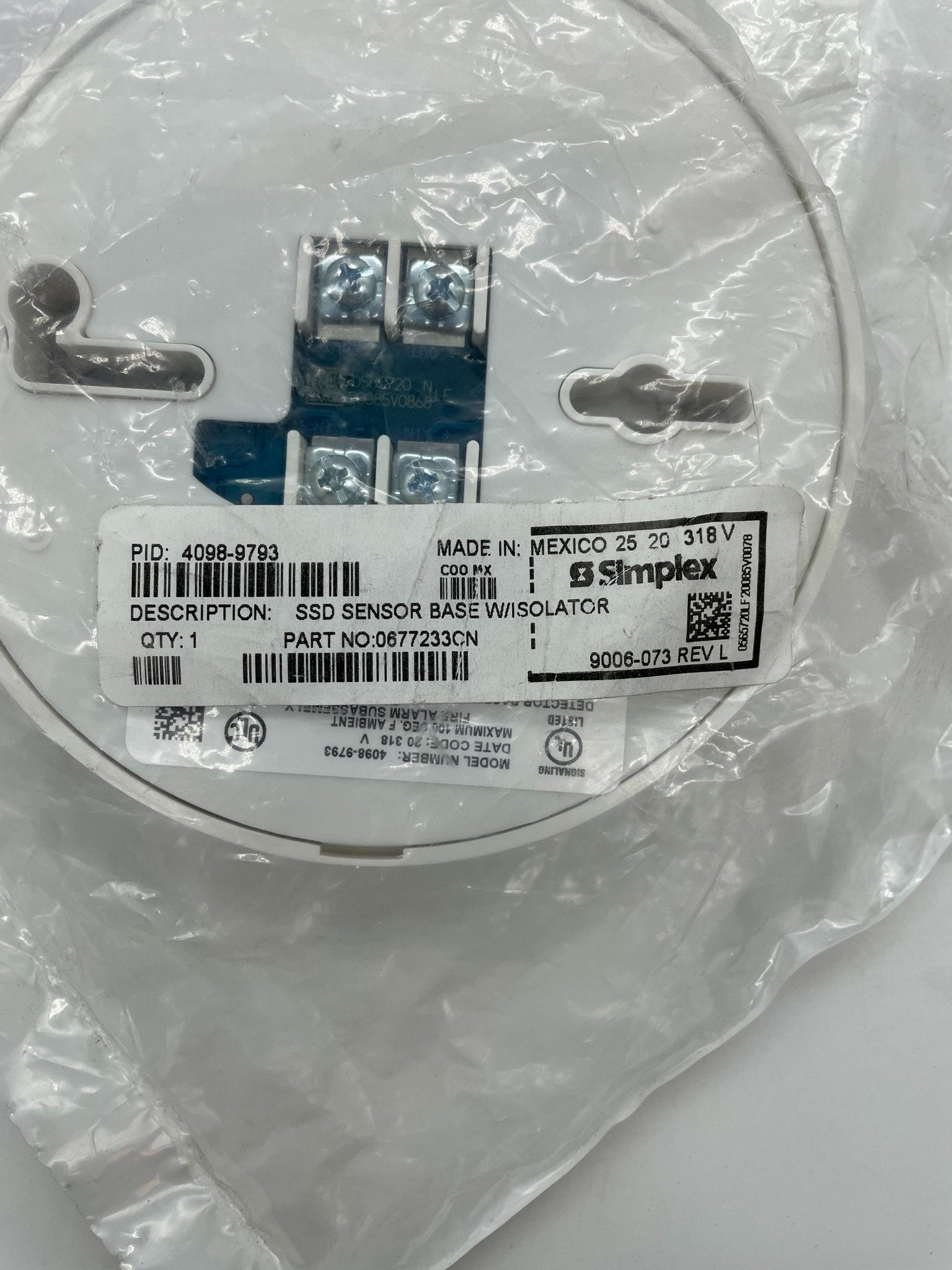 Simplex 4098-9793 base for security systems, showing a sturdy plastic enclosure with mounting options and connection ports.