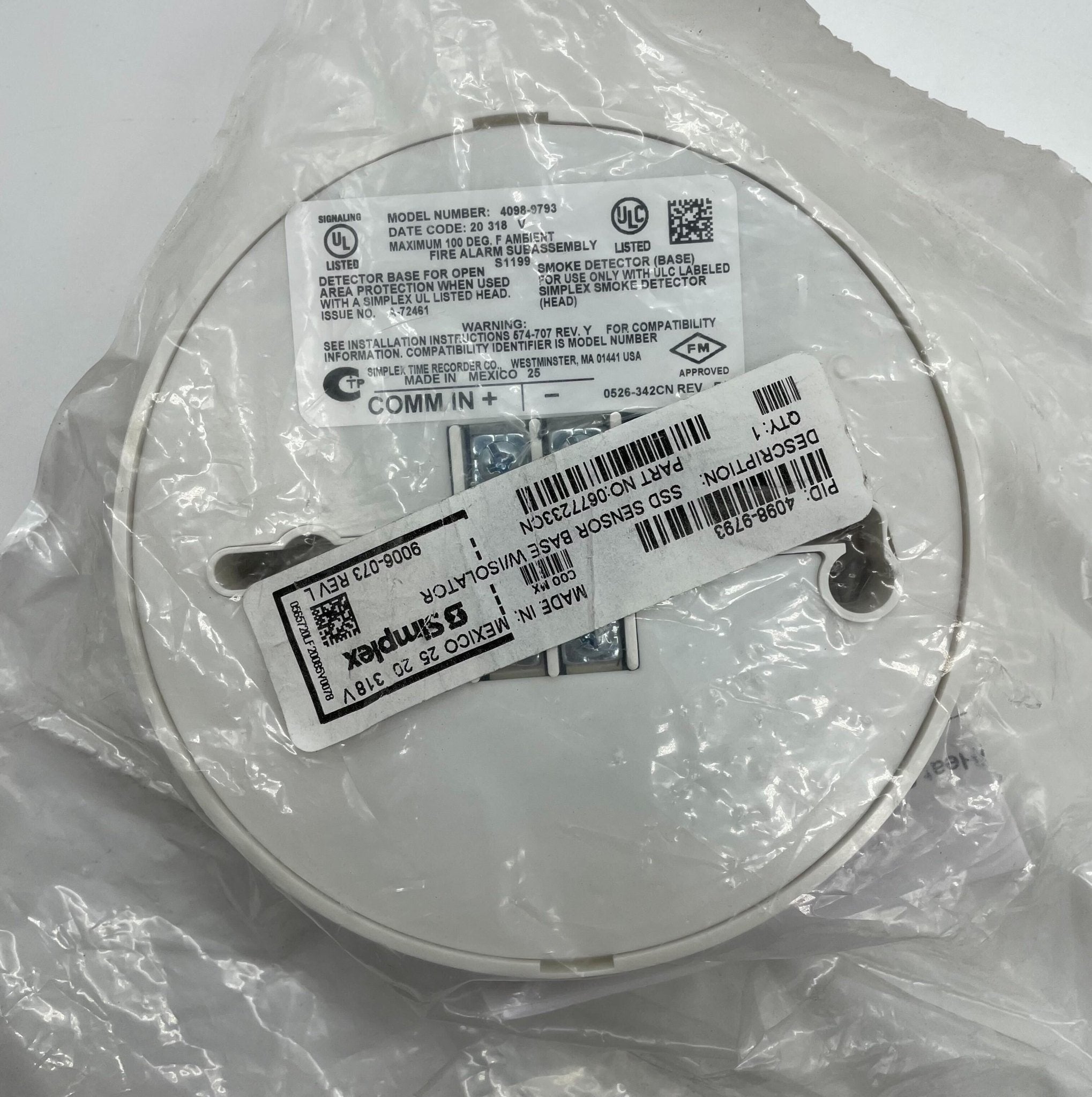 Simplex 4098-9793 base for security systems, shown with mounting hardware and connectors, in a neutral setting.