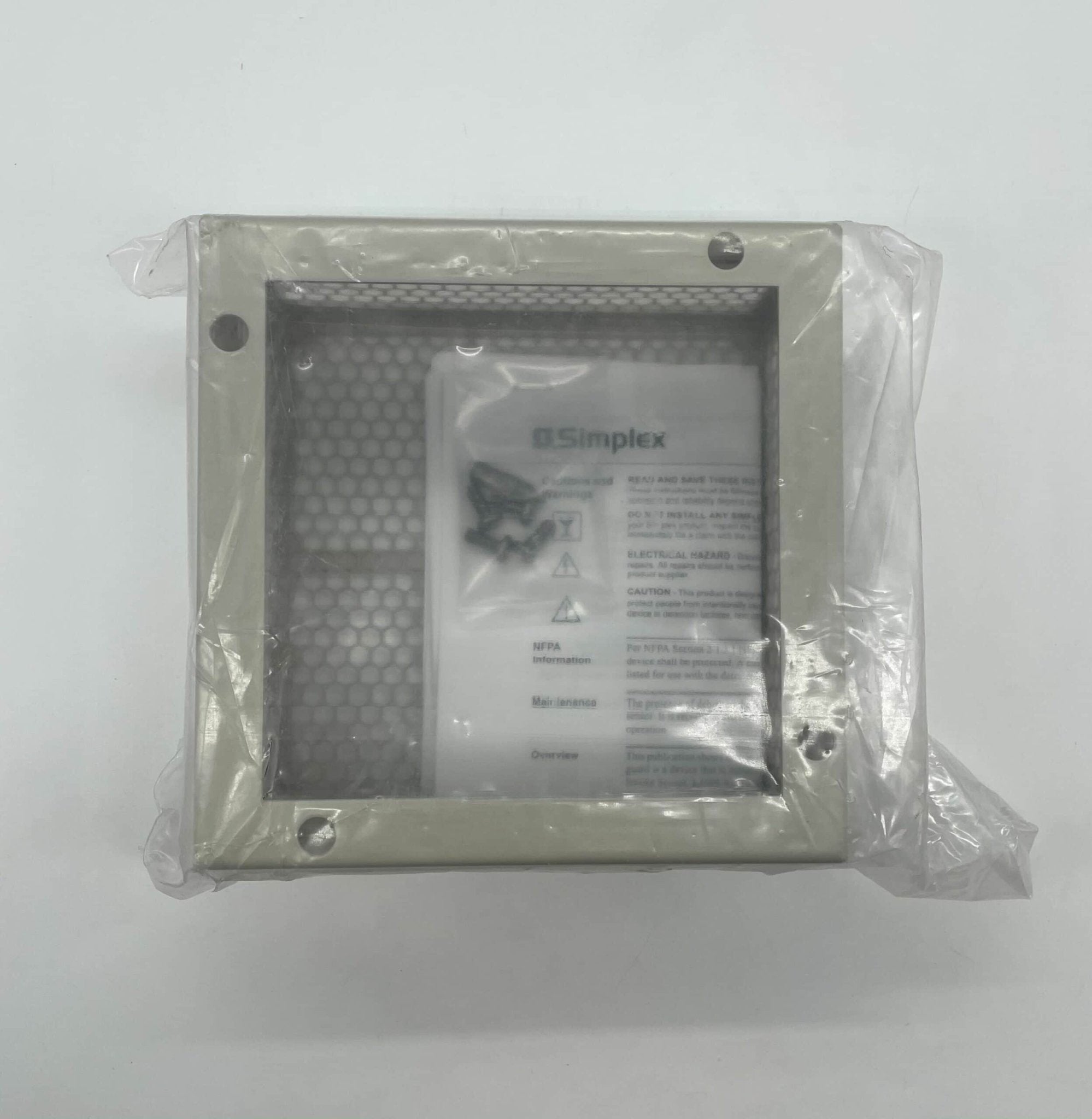 Simplex 4098-9846 fire alarm with white plastic cover and mounting base, designed for building safety and emergency alerts