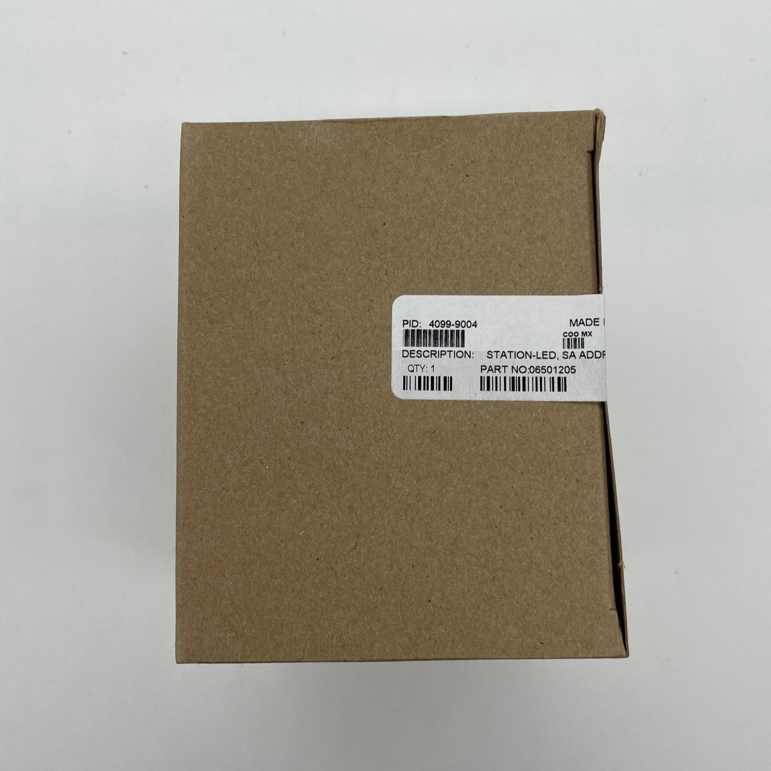 Simplex 4099-9004 single-action pull station mounted on wall, with clear label and safety features, used for emergency fire alarms.