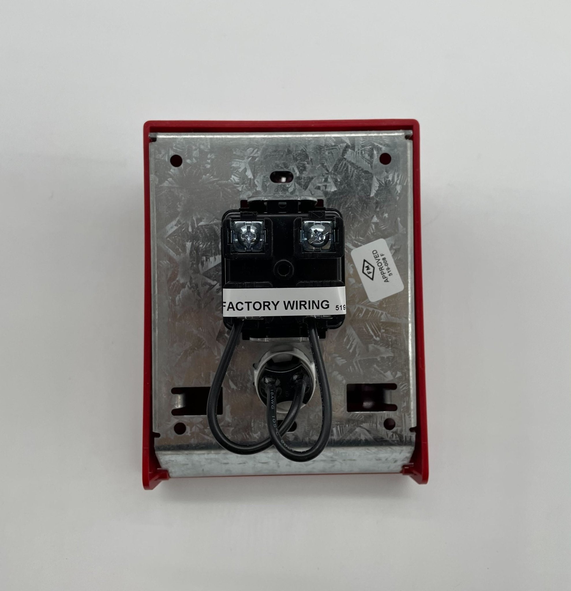 Simplex 4099-9021 pull station for fire alarm systems, mounted on wall with clear label and emergency activation handle.