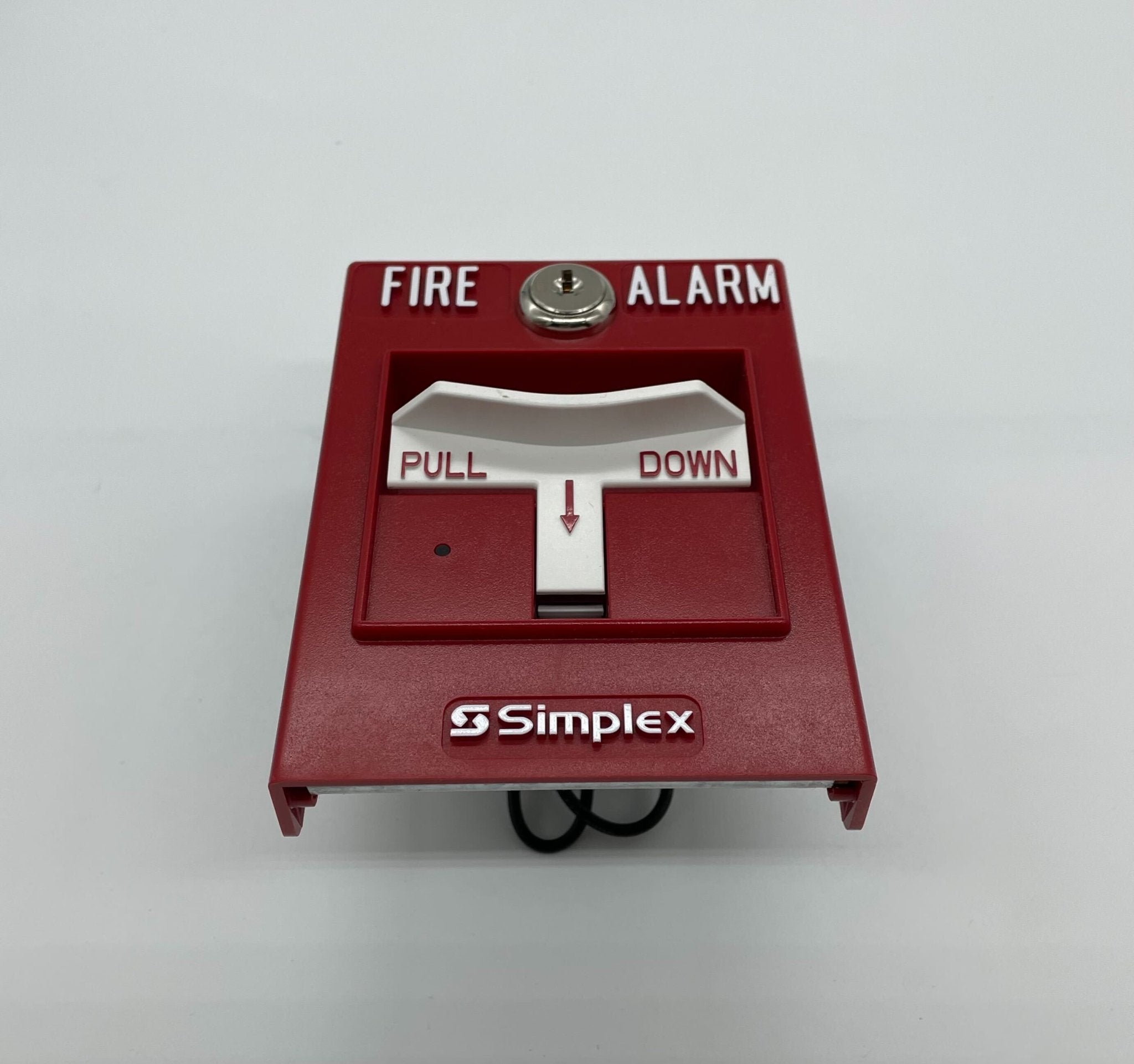 Simplex 4099-9021 pull station fire alarm switch with red button and metal casing, designed for emergency fire systems.
