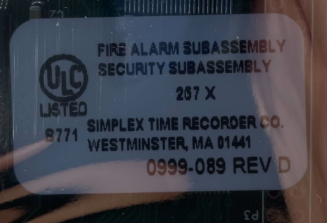 Simplex 4100-0640 fire alarm device with visible wiring and mounting bracket, designed for building safety systems.