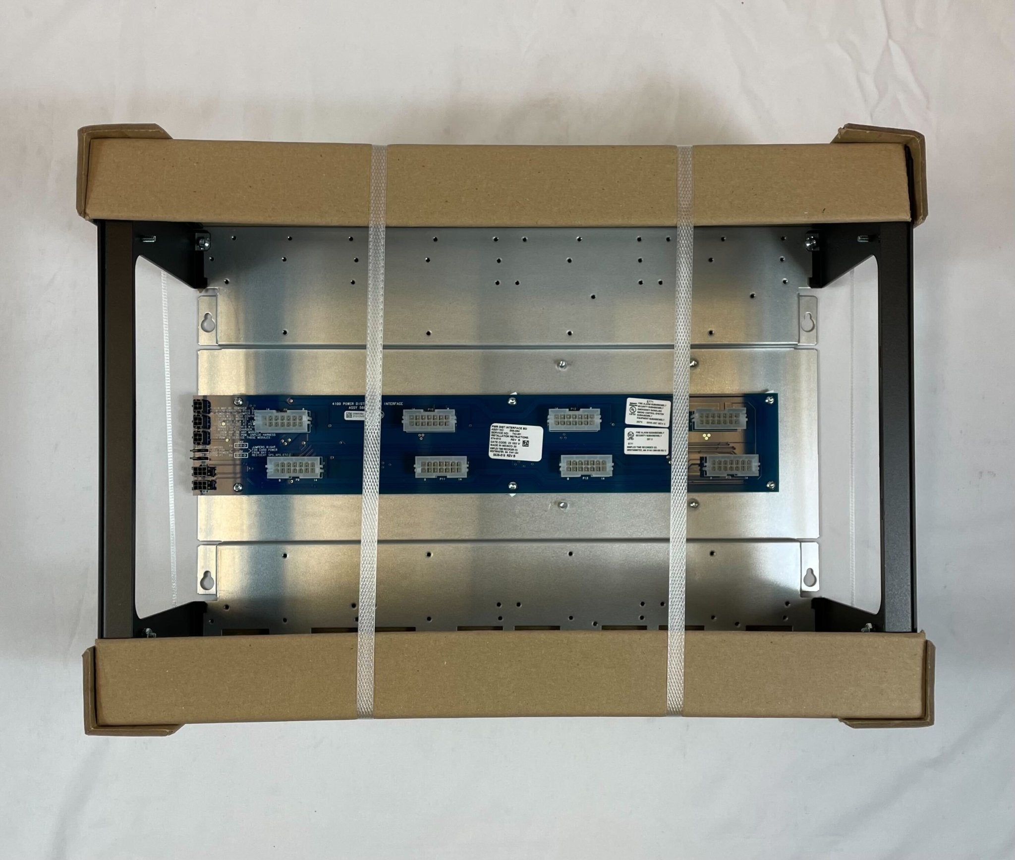 Simplex 4100-2300 fire alarm control panel with multiple indicator lights and wiring connections, mounted on a wall.
