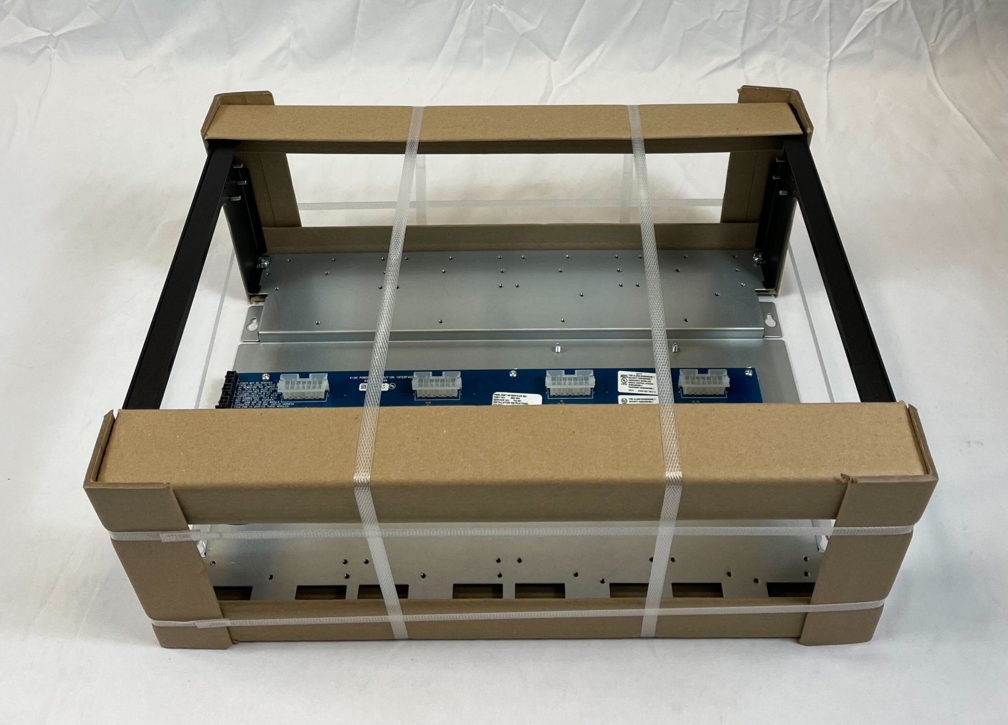 Simplex 4100-2300 fire alarm control panel with digital display and alarm indicators, installed in a building safety system.