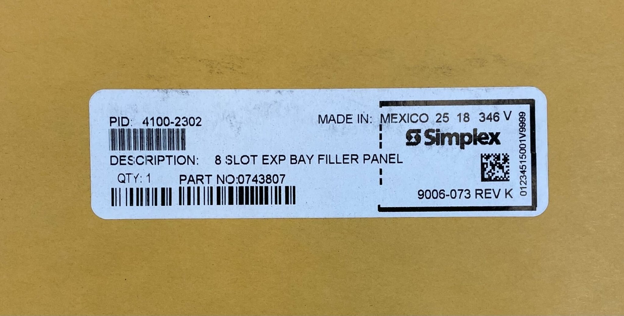 Simplex 4100-2302 control panel by Simplex, with electronic components and interface visible on the front panel.