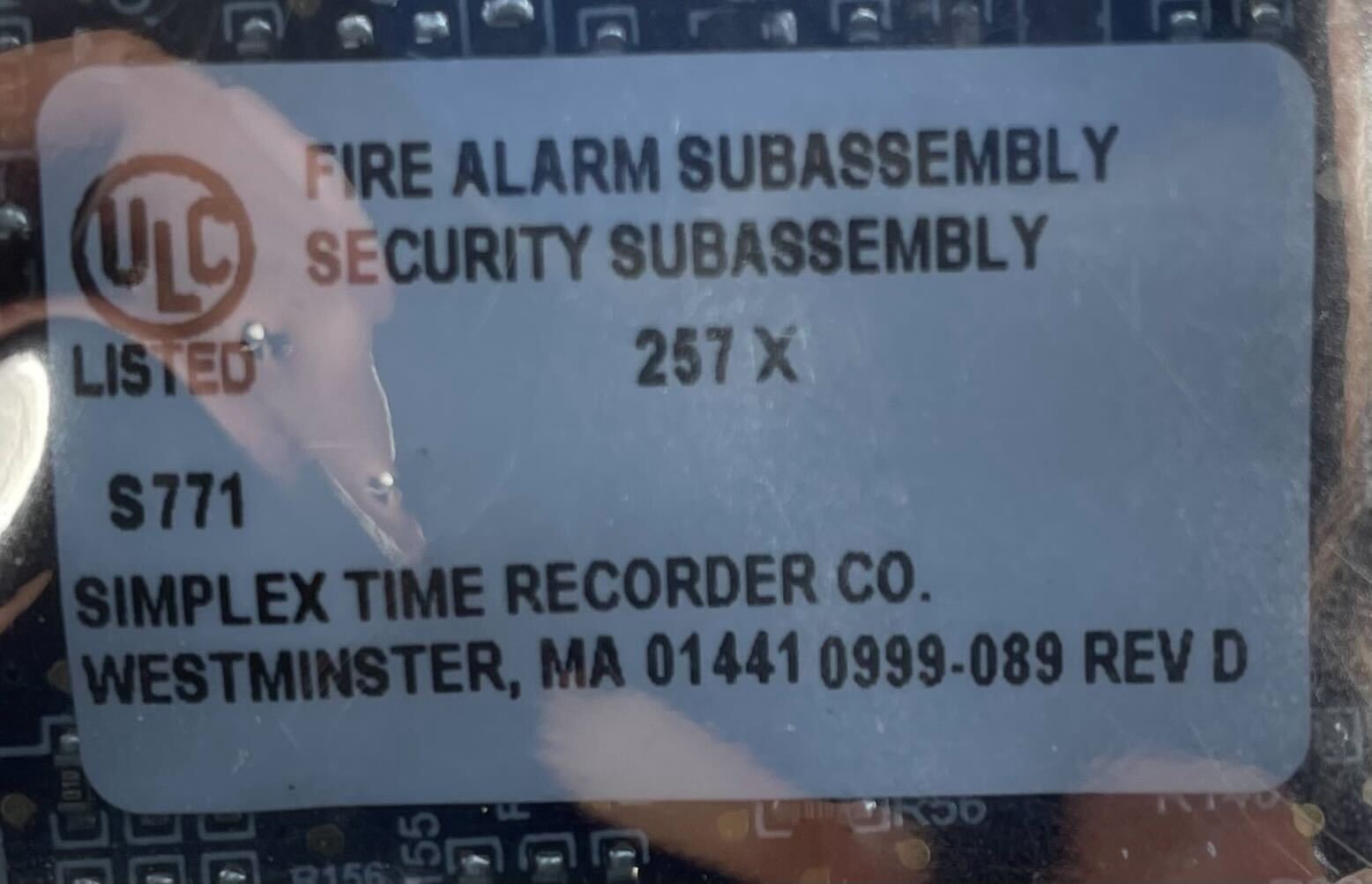 Simplex 4100-6103 fire alarm system with control panel, mounted on a wall, used for building safety and fire detection.
