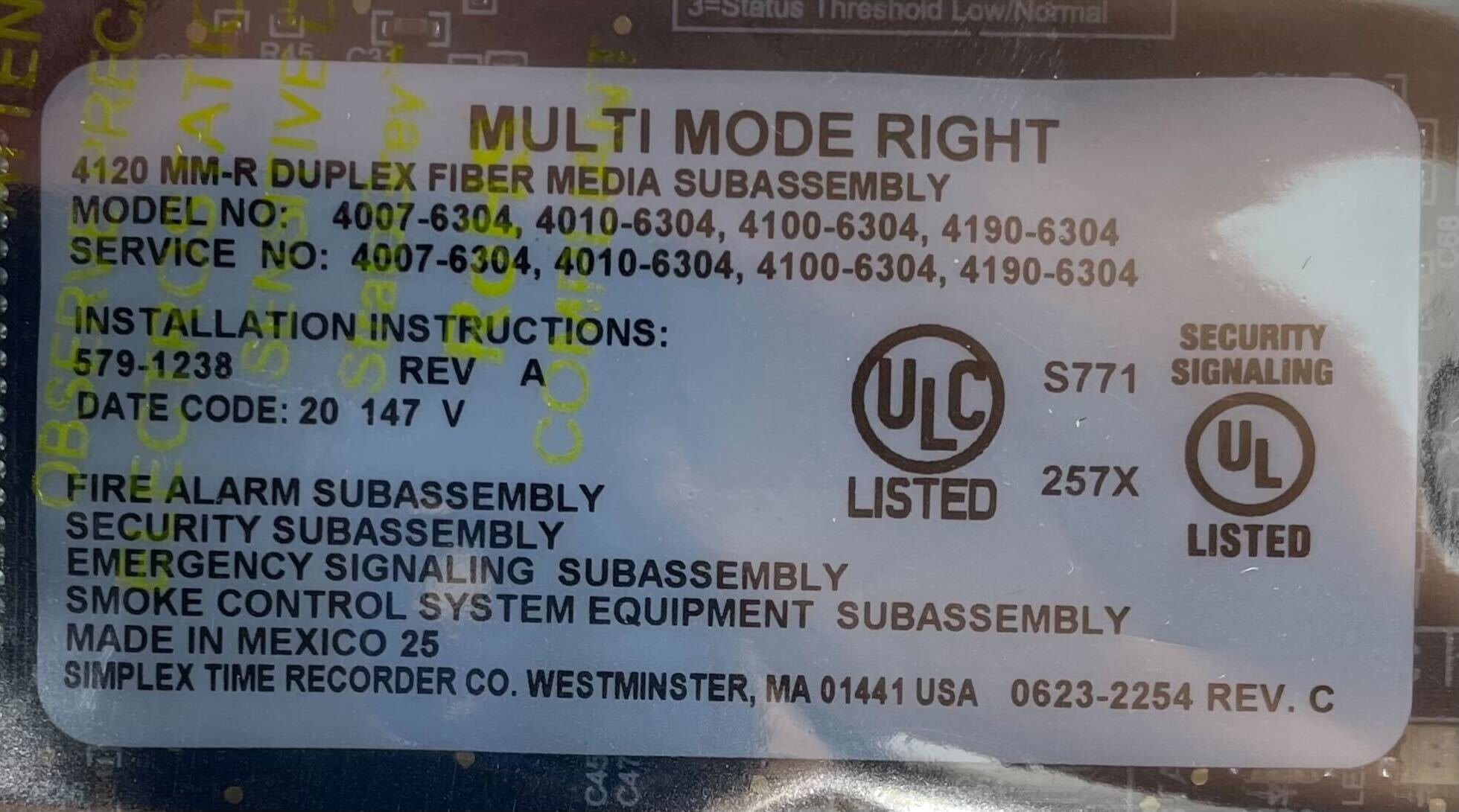 Simplex 4100-6304 fire alarm system with control panel and wiring for building safety.