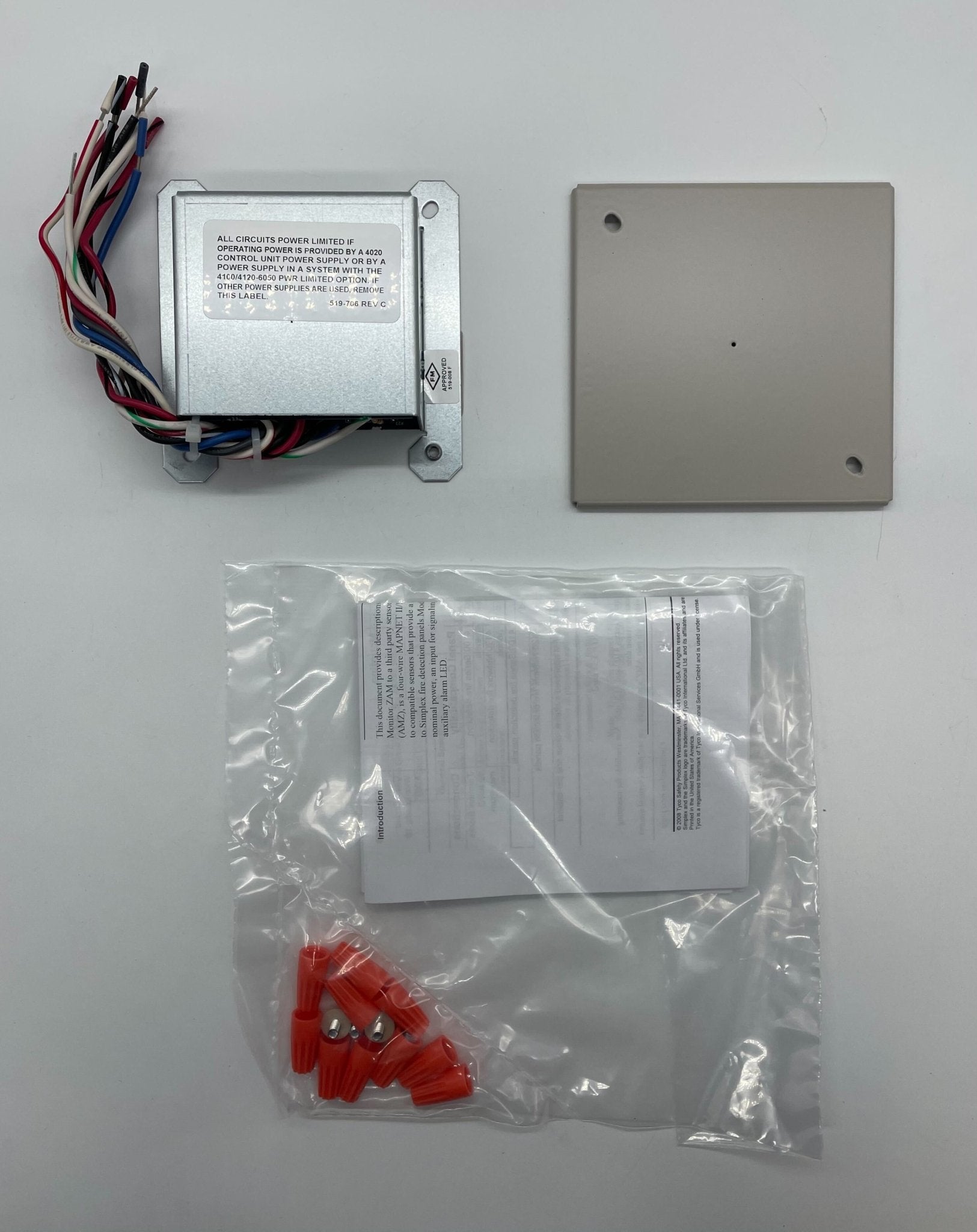 Simplex 4190-9050 fire alarm, a sleek device with a white faceplate and sensor, mounted on a wall.