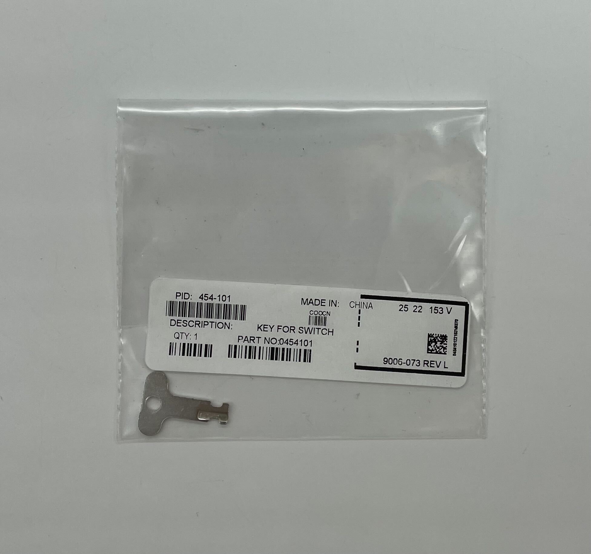 Simplex 454-101 fire alarm with white casing and mounting bracket, designed for building safety and emergency alert systems.