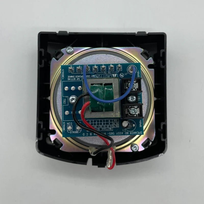 Simplex 4902-9717 fire alarm control panel with digital display and control buttons, mounted on a wall.