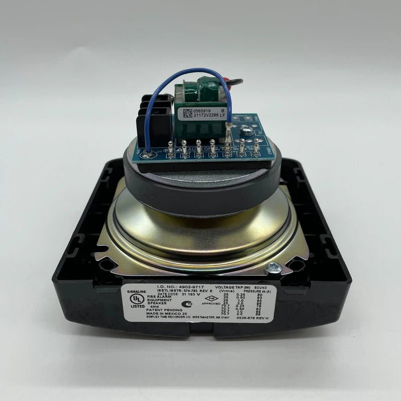 Simplex 4902-9717 alarm control panel with digital display and keypad, used for security system management.